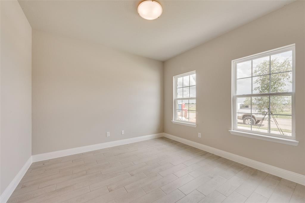 3206 Ferrero Lane Princeton, TX 75407 - Photo 6 of 29 an empty room with a window