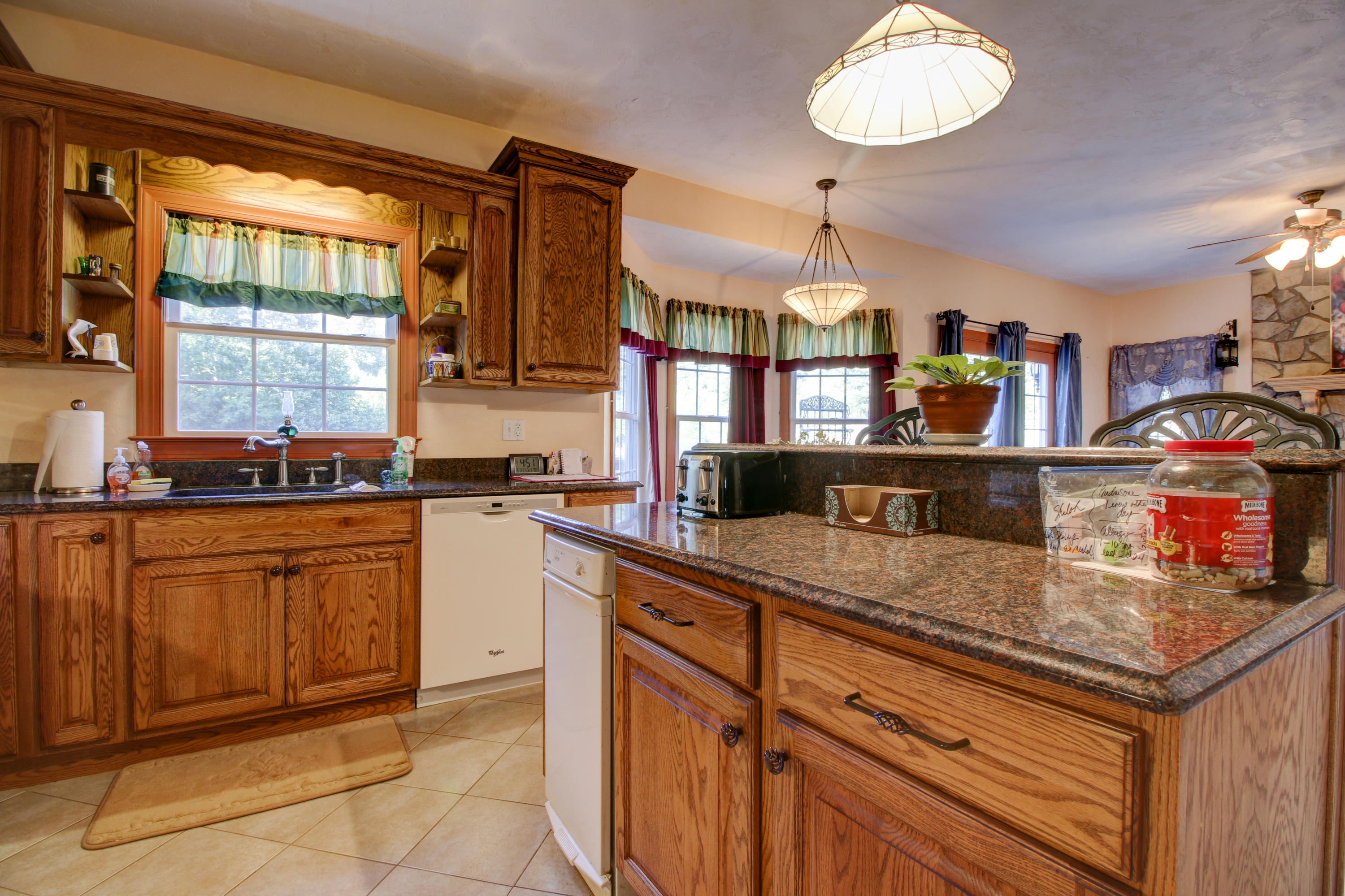 4020 Hatchett Road Penhook, VA 24137 - Photo 11 of 64 a kitchen with stainless steel appliances granite countertop a sink and cabinets