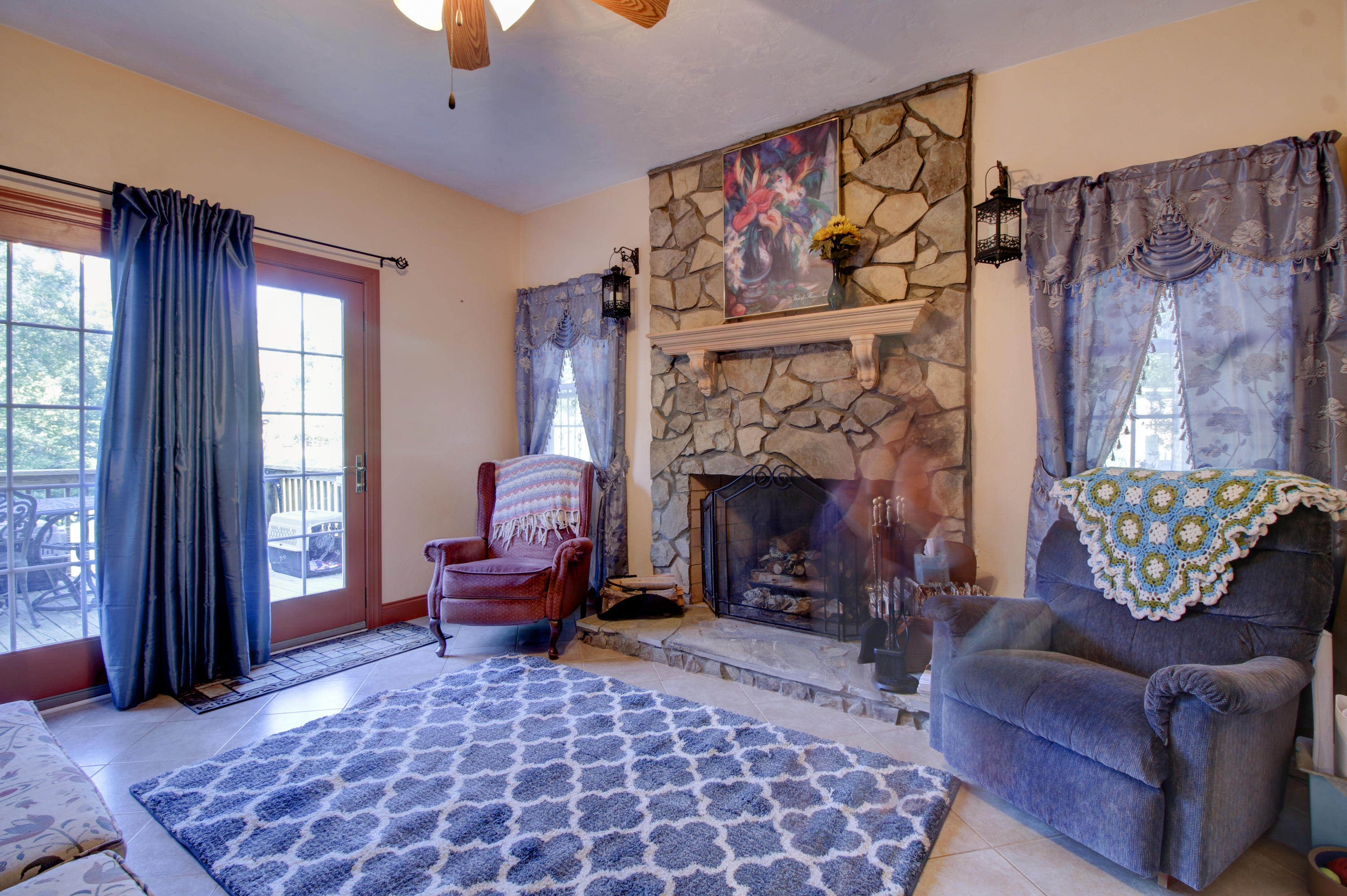 4020 Hatchett Road Penhook, VA 24137 - Photo 17 of 64 a living room with furniture and a fireplace