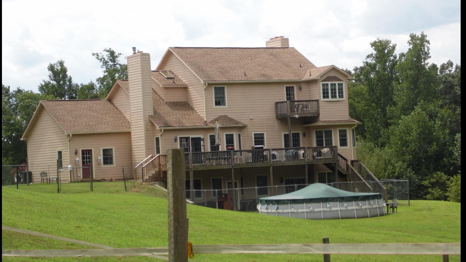 4020 Hatchett Road Penhook, VA 24137 - Photo 3 of 64 a front view of a house with a yard