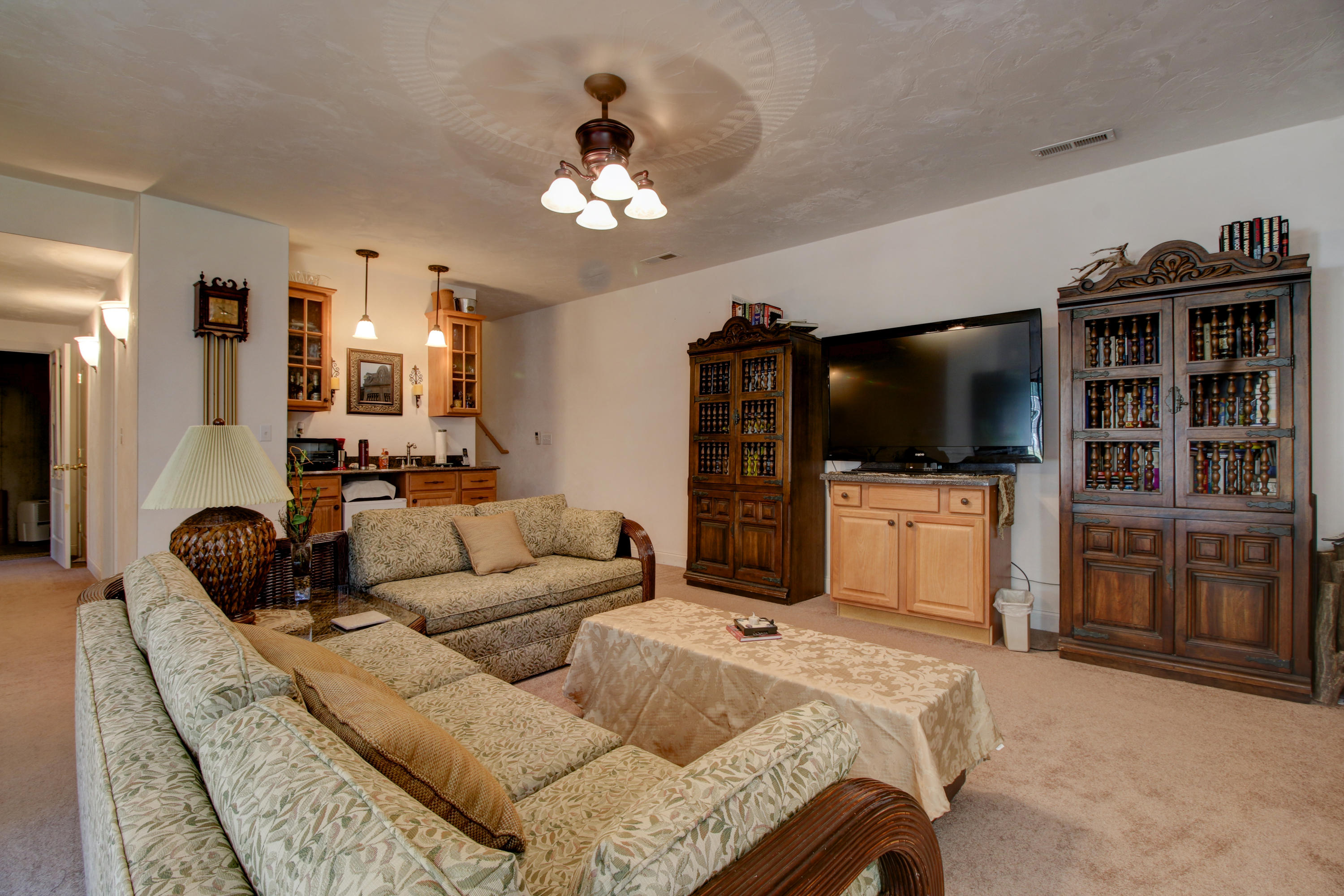 4020 Hatchett Road Penhook, VA 24137 - Photo 36 of 64 a living room with furniture and a flat screen tv