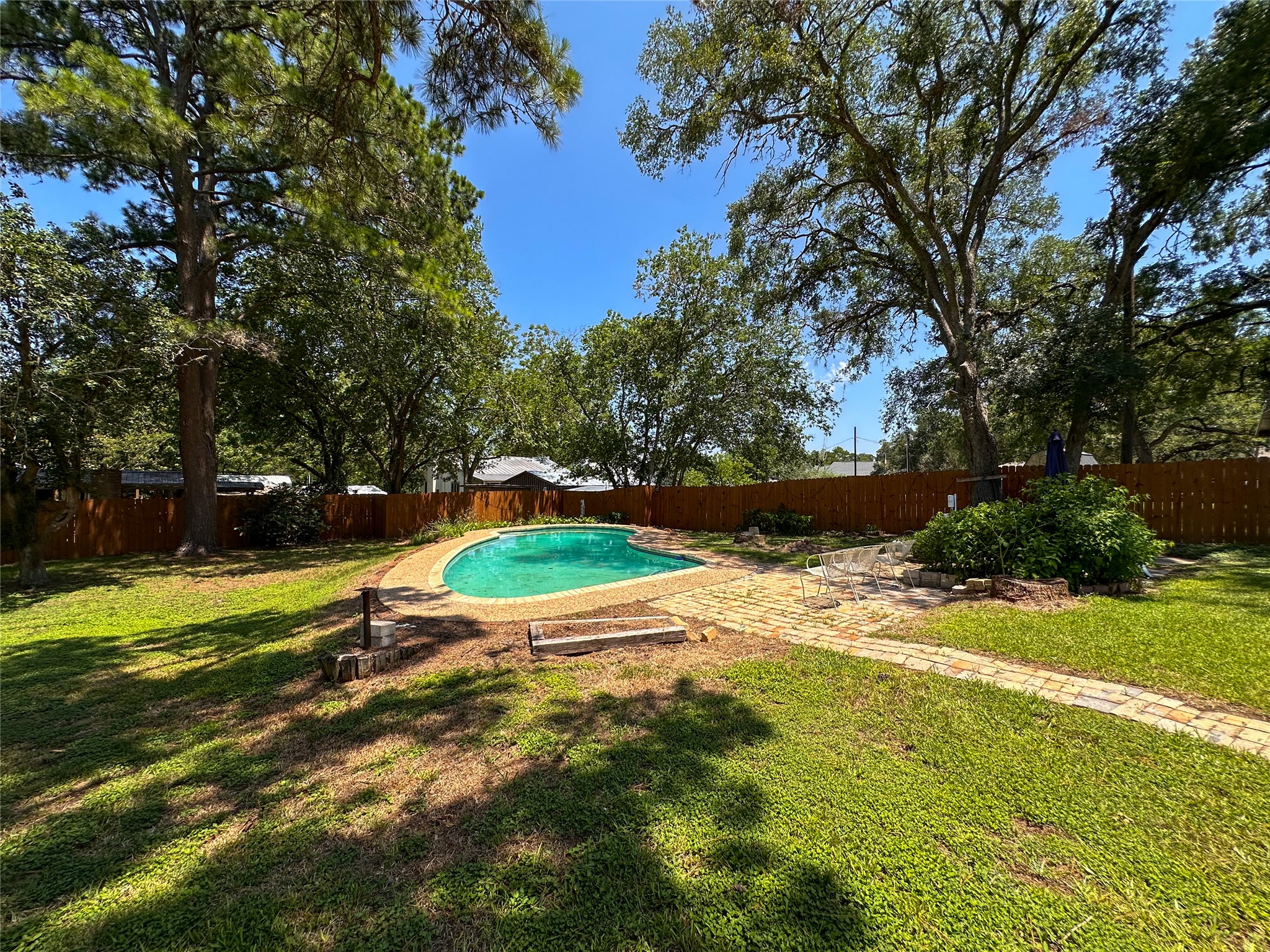 407 4th Avenue Smithville, TX 78957 - Photo 2 of 37 a view of a playground with basketball court