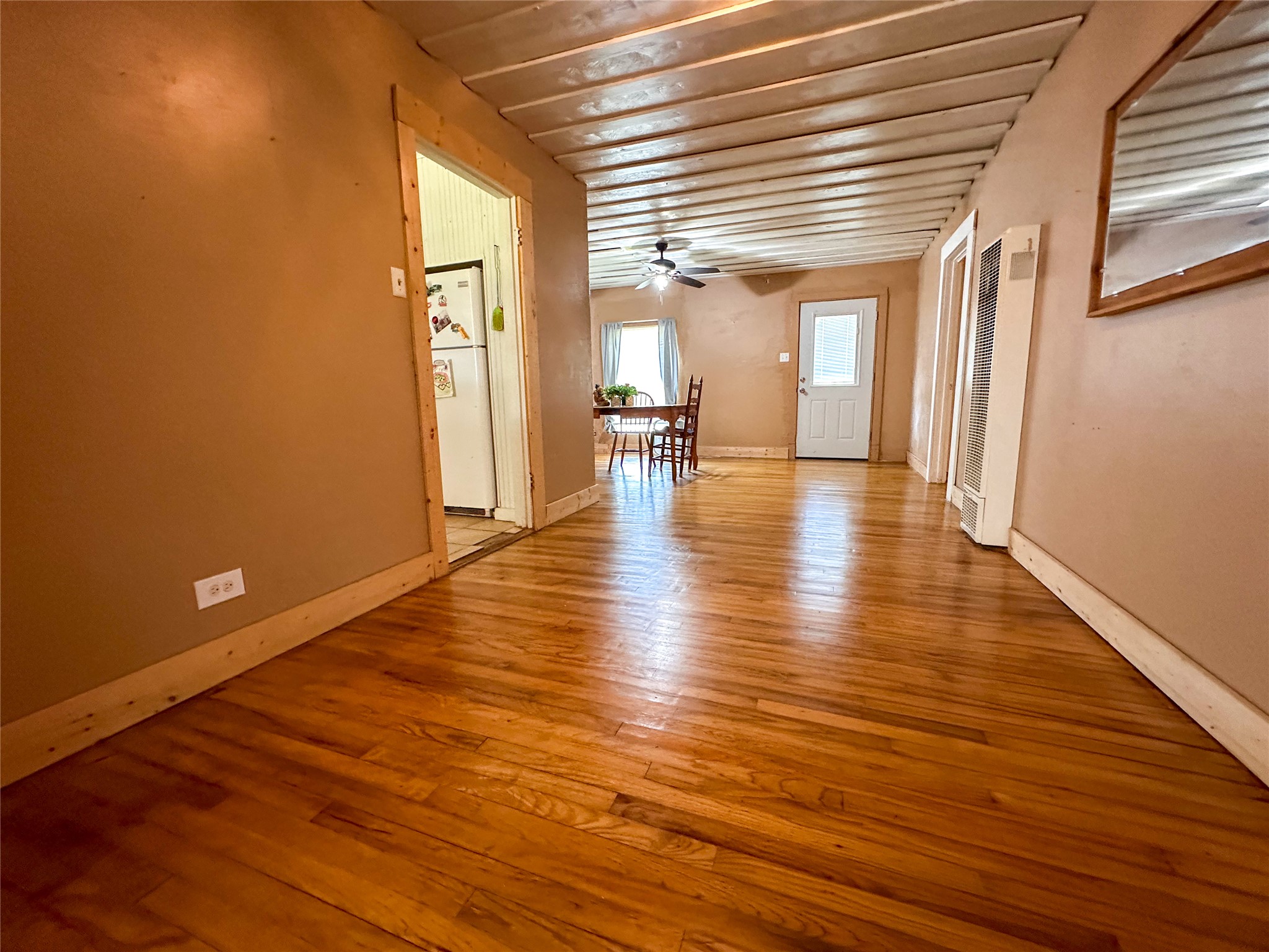 407 4th Avenue Smithville, TX 78957 - Photo 21 of 37 a view of empty room with wooden floor and fan