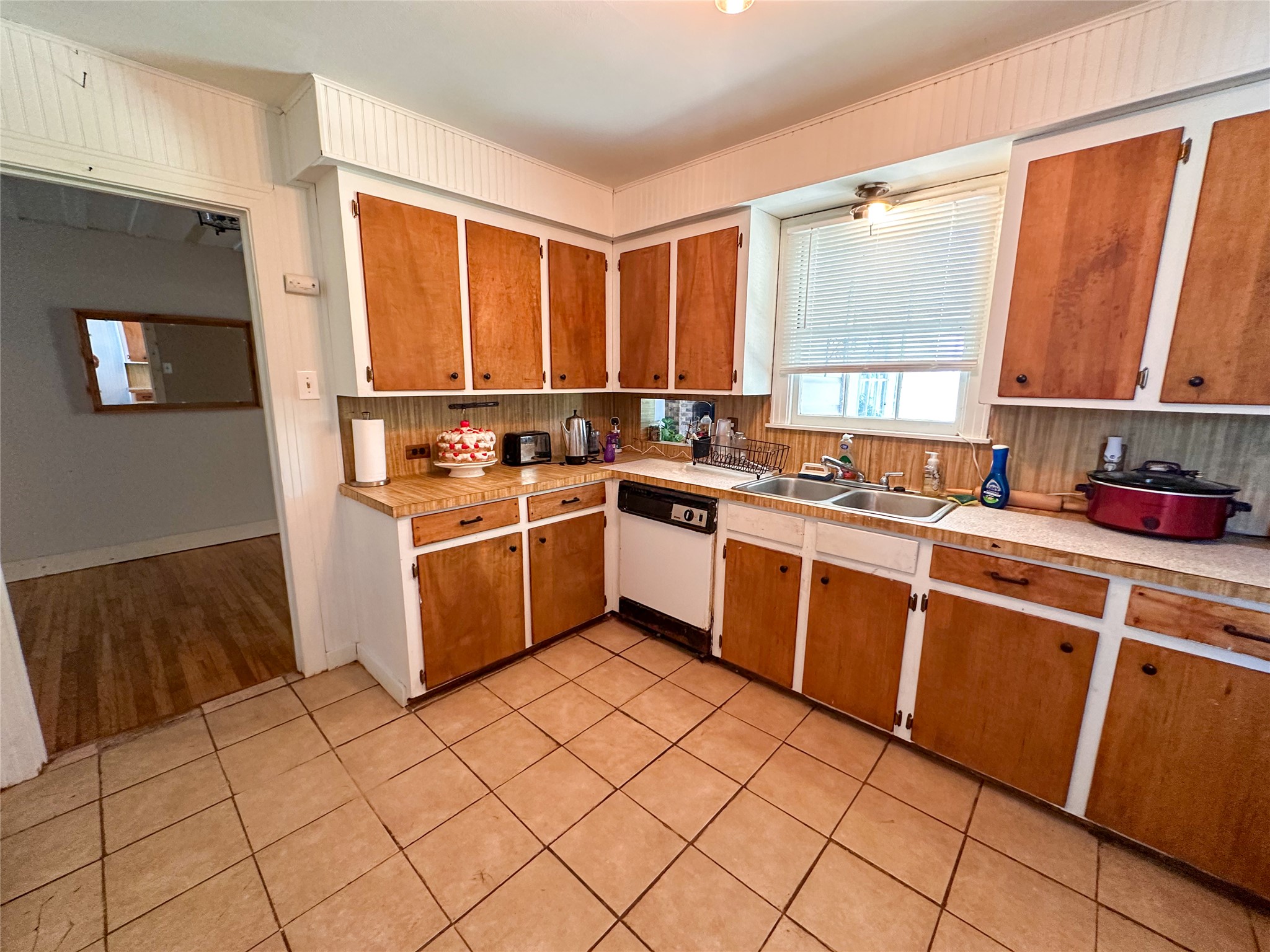 407 4th Avenue Smithville, TX 78957 - Photo 24 of 37 a kitchen with a sink a stove top oven and cabinets
