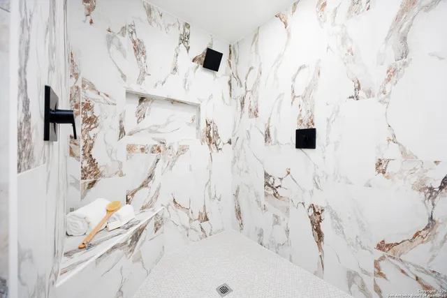 a bathroom with a shower curtain