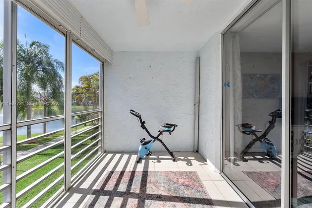 a view of a balcony and chairs