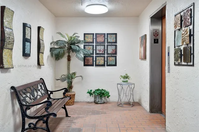 a view of a entryway with furniture and front door