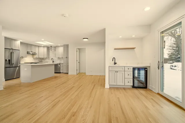 a view of kitchen with wooden floor
