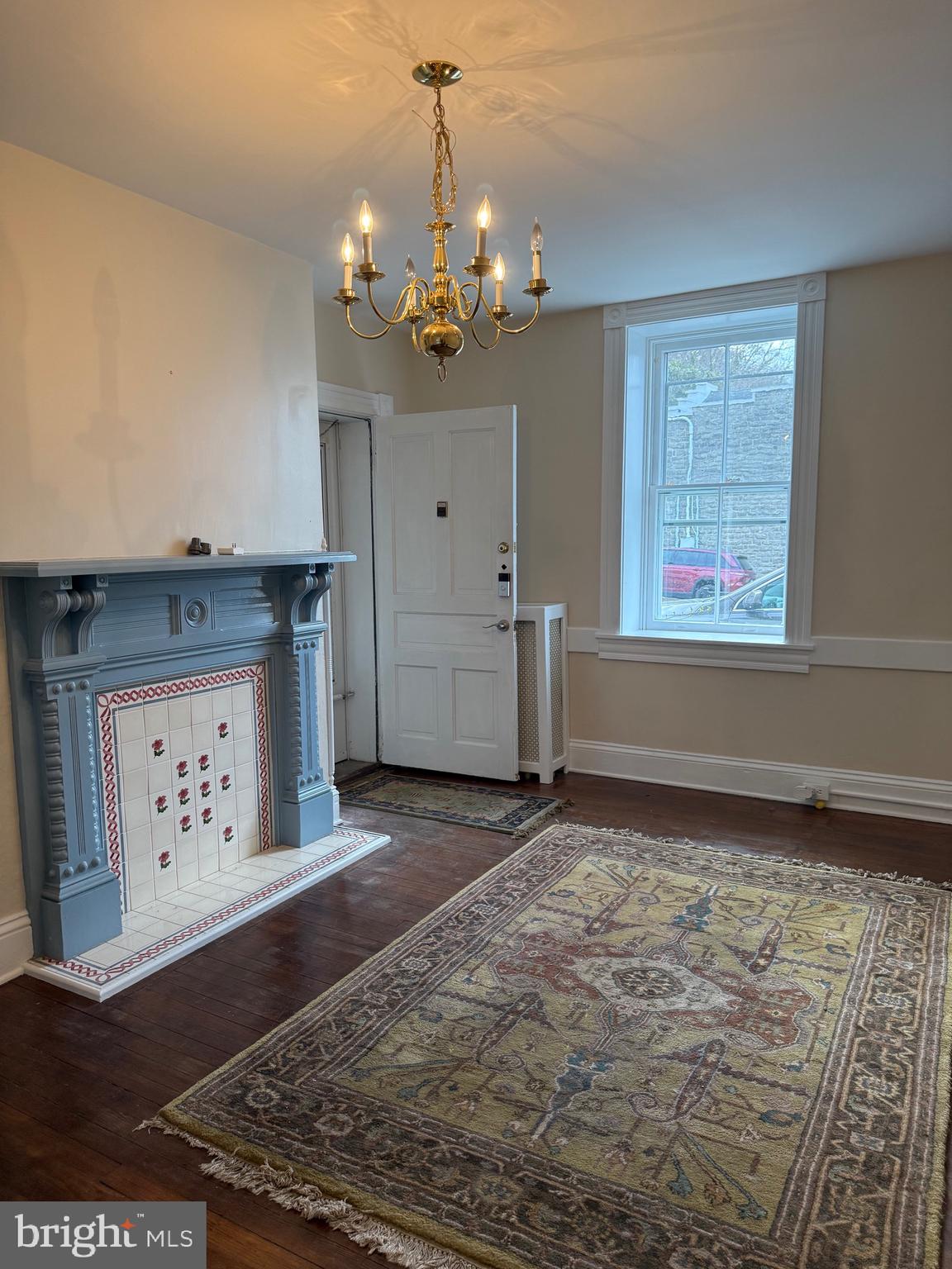 1 Center Street, Unit MAIN Port Deposit, MD 21904 - Photo 3 of 14 a view of an empty room with window and wooden floor