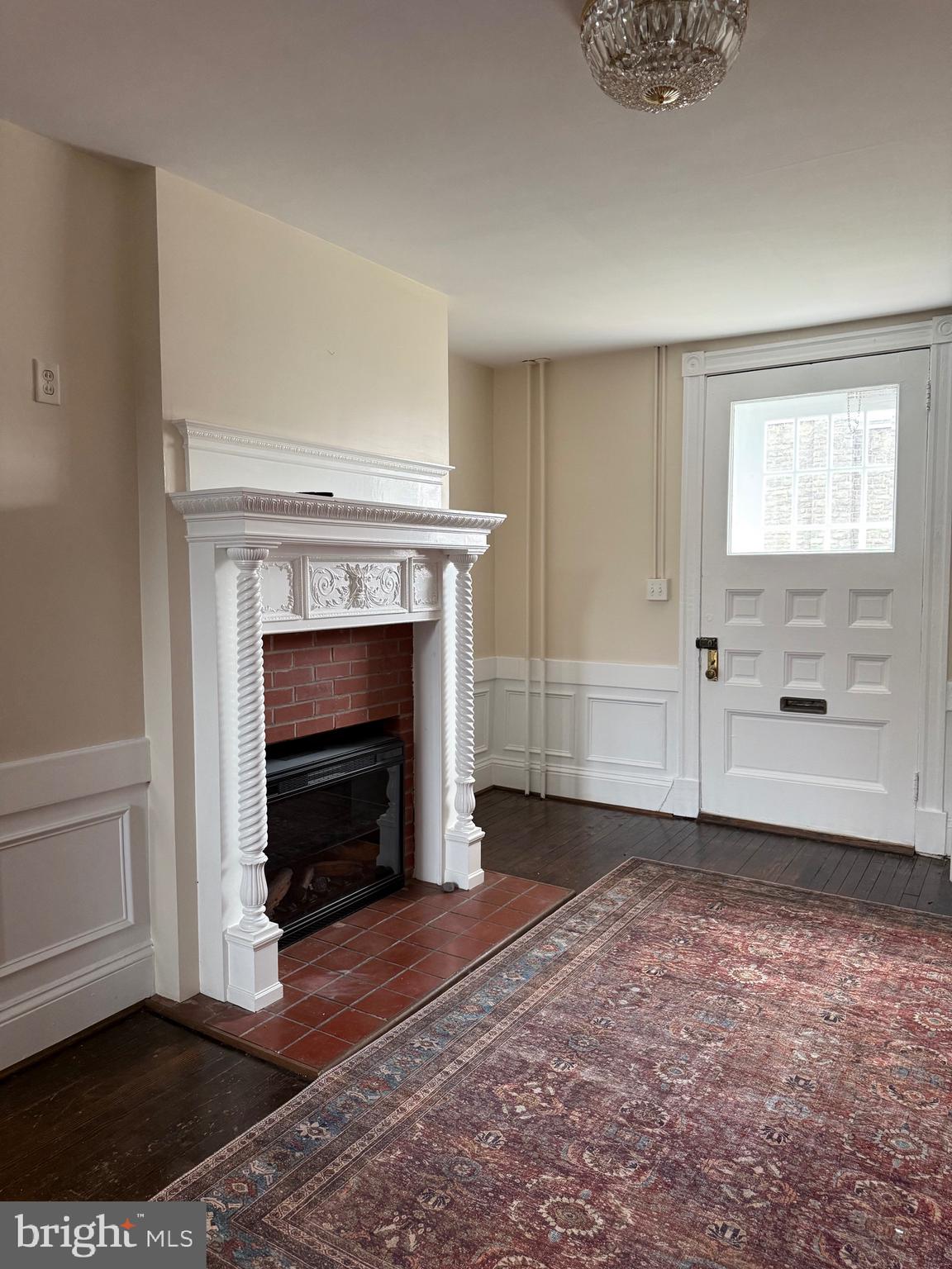1 Center Street, Unit MAIN Port Deposit, MD 21904 - Photo 6 of 14 a view of an empty room with a fireplace