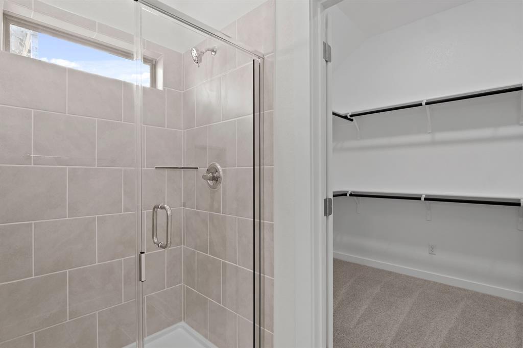 317 Millwood Road Lavon, TX 75166 - Photo 11 of 17 Primary Bathroom in the Pecan II home plan by Trophy Signature Homes – REPRESENTATIVE PHOTO