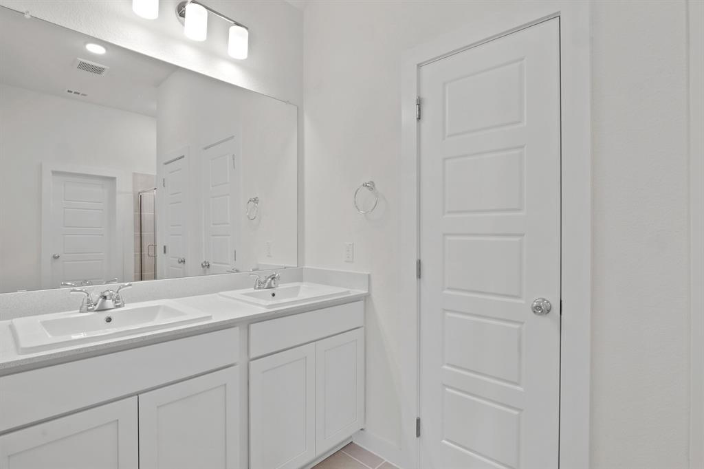 317 Millwood Road Lavon, TX 75166 - Photo 12 of 17 Primary Bathroom in the Pecan II home plan by Trophy Signature Homes – REPRESENTATIVE PHOTO