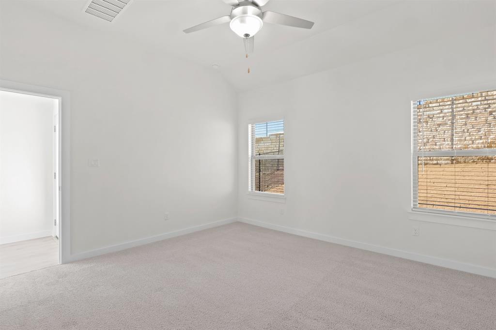 317 Millwood Road Lavon, TX 75166 - Photo 10 of 17 Primary Bedroom in the Pecan II home plan by Trophy Signature Homes – REPRESENTATIVE PHOTO