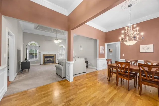 a view of a livingroom with furniture and hardwood floor