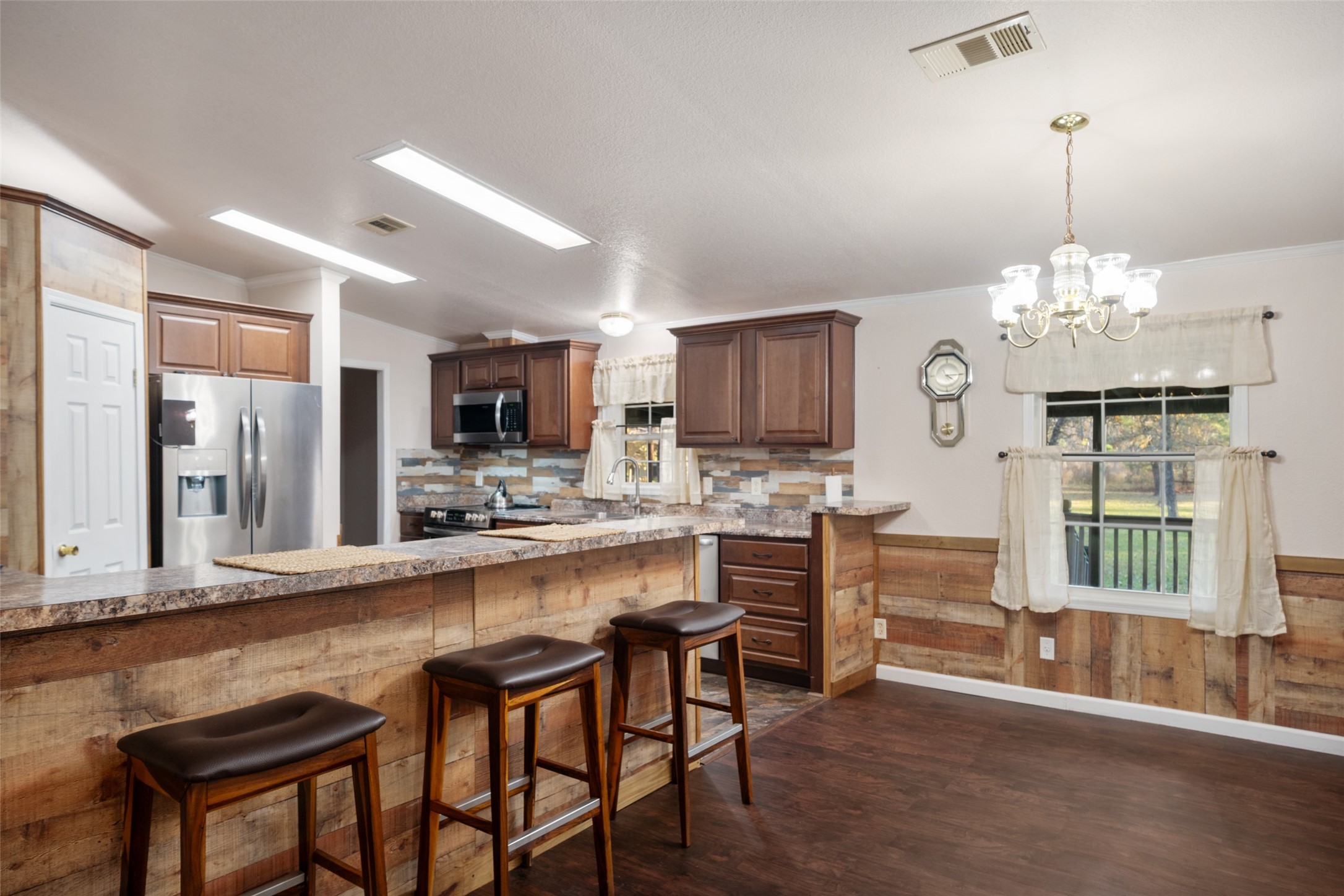 31351 Buckeye Road Waller, TX 77484 - Photo 13 of 36 a large kitchen with a table and chairs