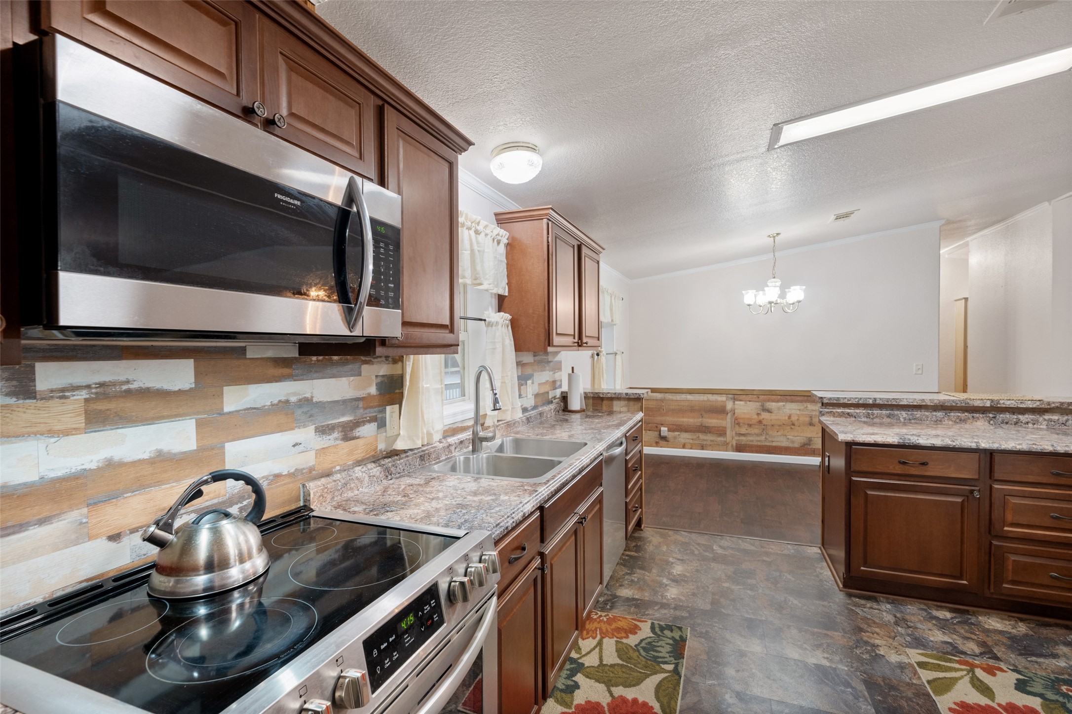 31351 Buckeye Road Waller, TX 77484 - Photo 20 of 36 a kitchen with a stove and a sink
