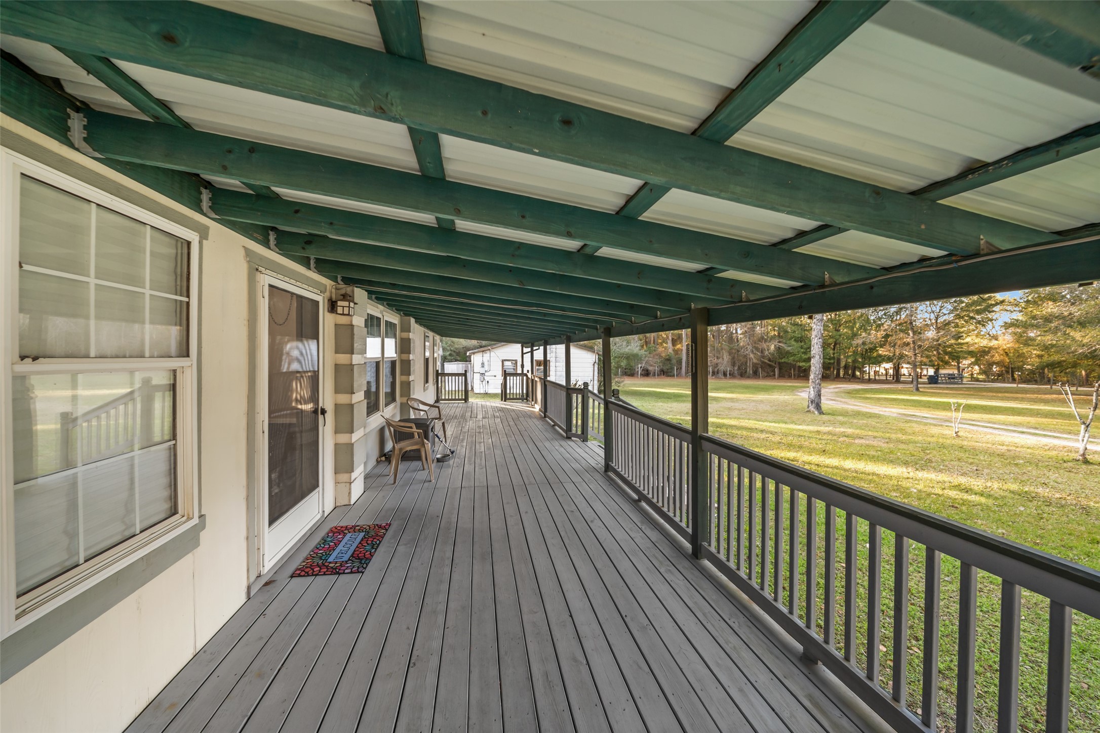 31351 Buckeye Road Waller, TX 77484 - Photo 7 of 36 a view of a balcony with wooden floor