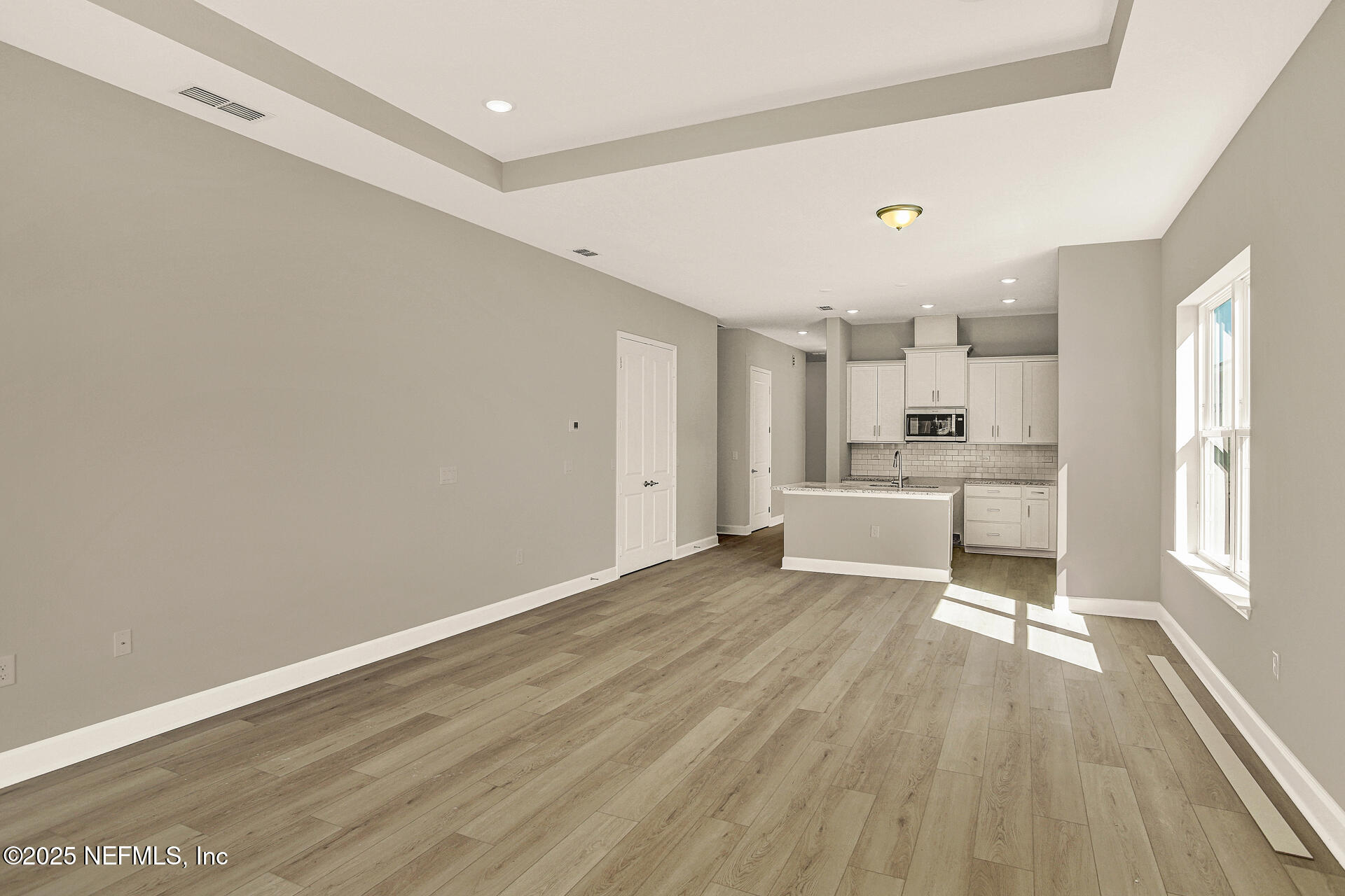 42 Tillia Trail St. Augustine, FL 32092 - Photo 15 of 18 a view of a kitchen with a sink and wooden floor
