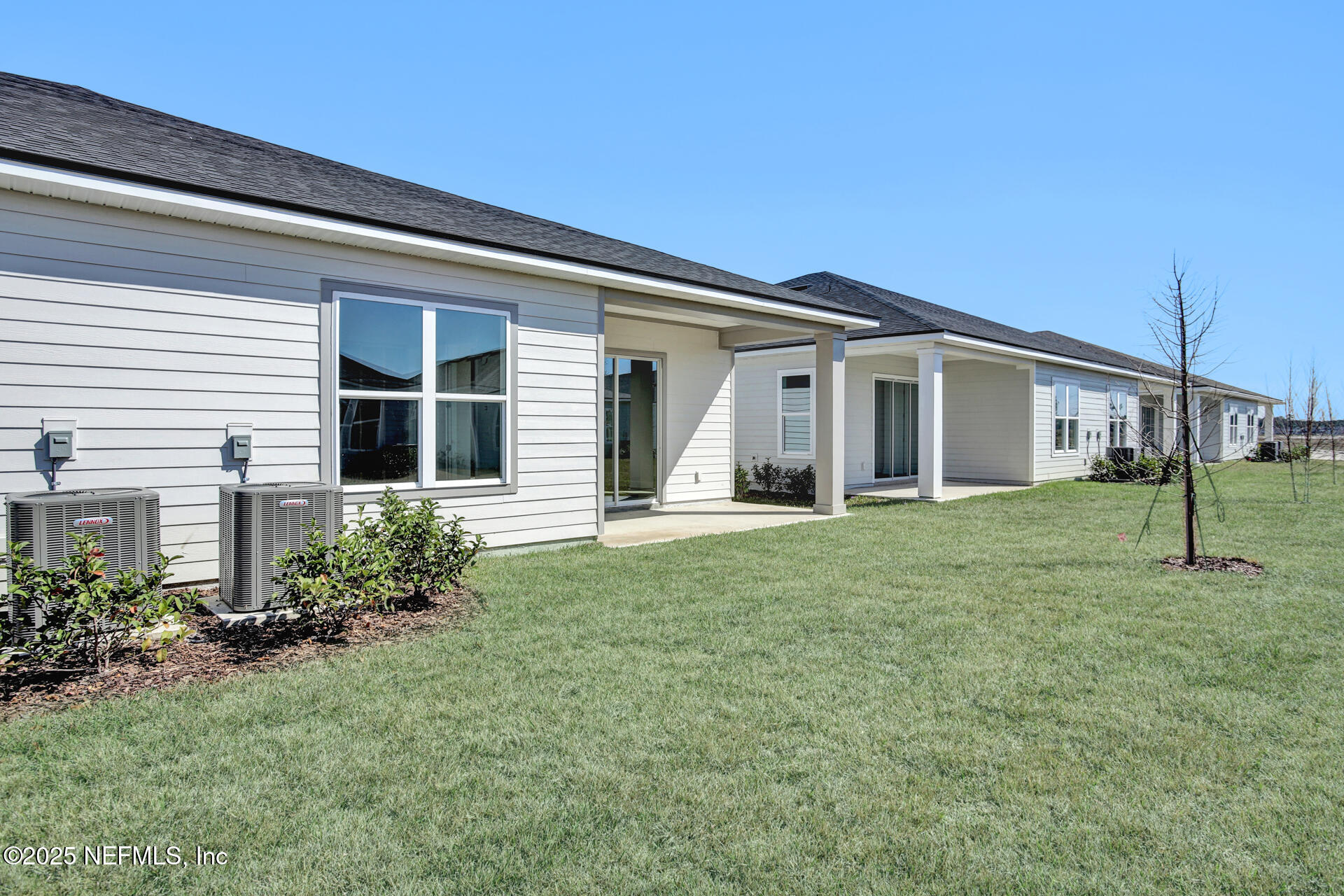 42 Tillia Trail St. Augustine, FL 32092 - Photo 5 of 18 front view of a house with a garden