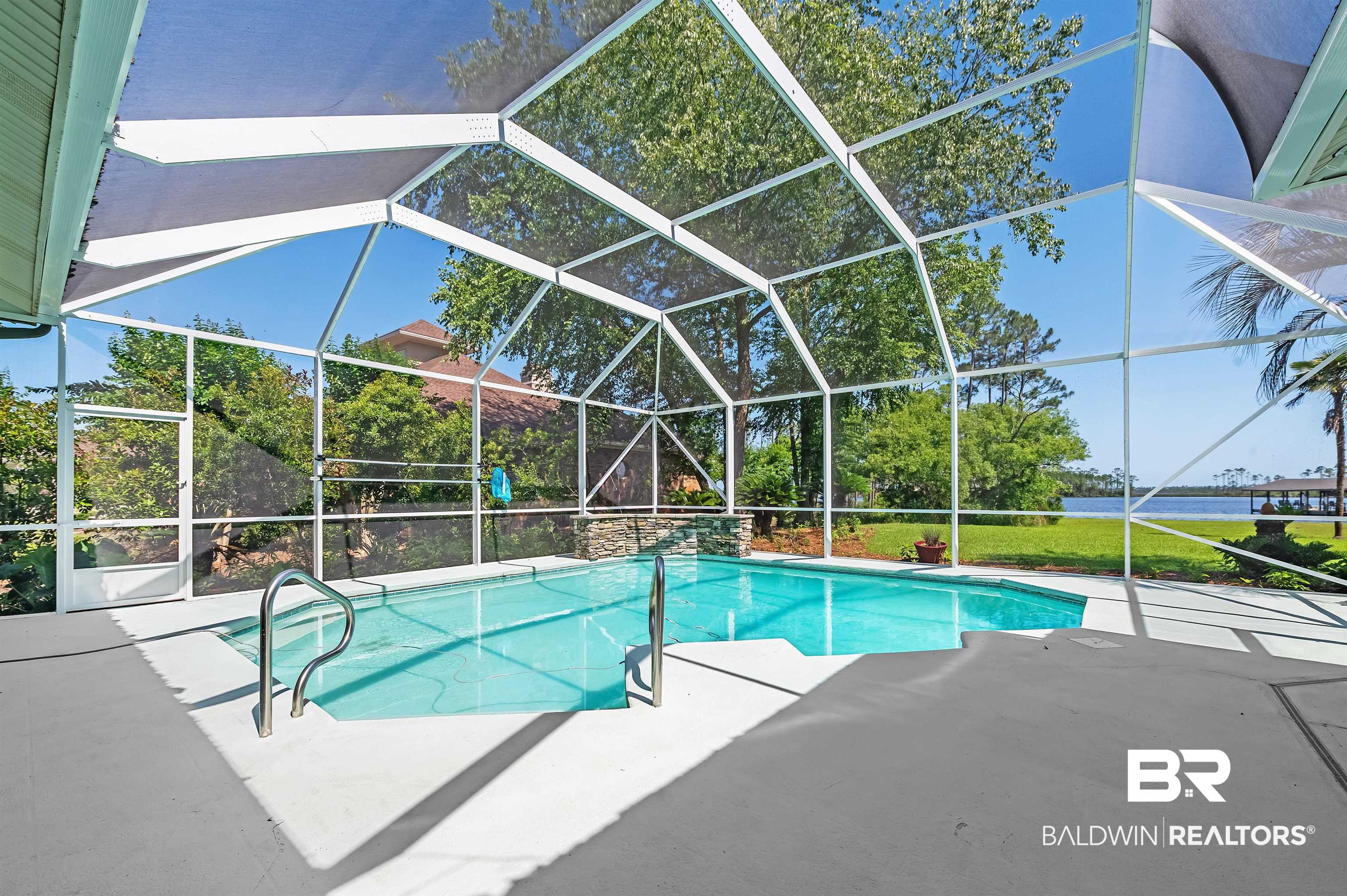 8160 Bay View Drive Foley, AL 36535 - Photo 32 of 43 Outdoor pool with a patio area and glass enclosure
