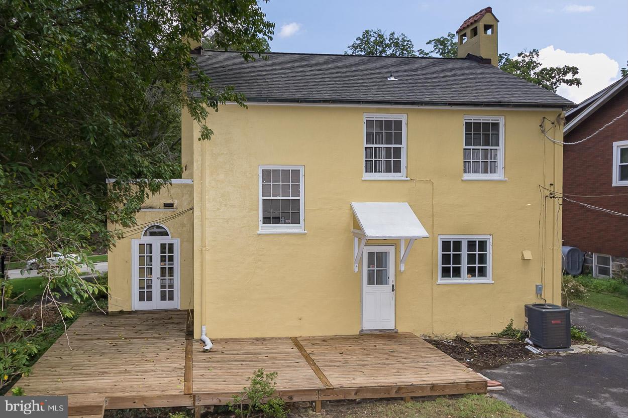 718 Brookwood Road Baltimore, MD 21229 - Photo 22 of 23 a front view of a house