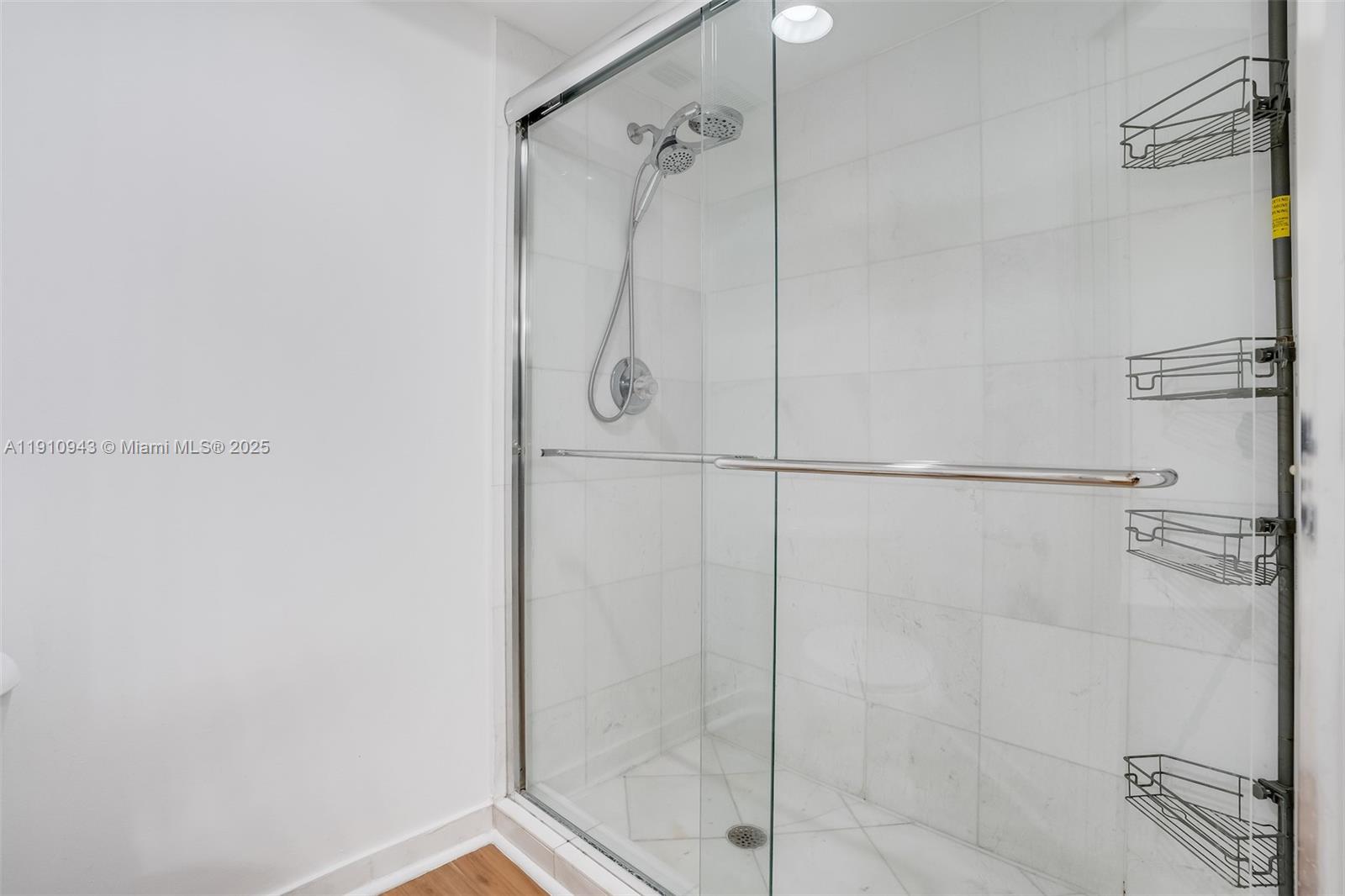 3500 Mystic Pointe Drive, Unit 1205 Aventura, FL 33180 - Photo 23 of 35 a bathroom with a shower