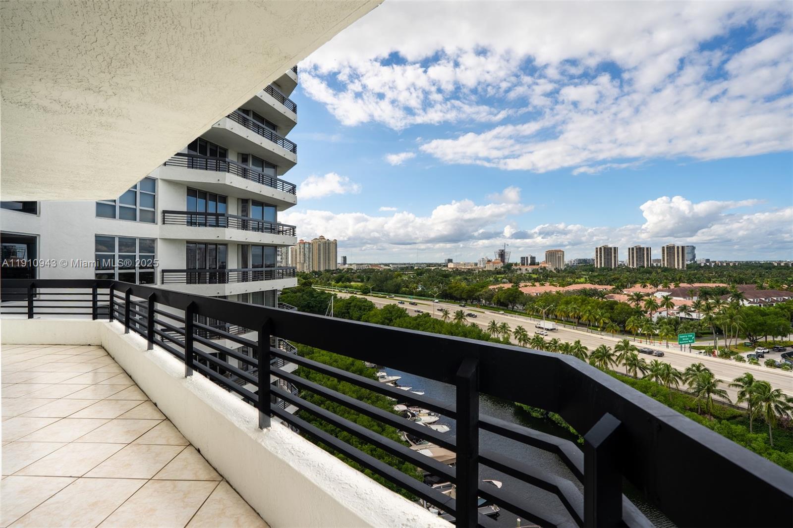 3500 Mystic Pointe Drive, Unit 1205 Aventura, FL 33180 - Photo 29 of 35 a view of city from a balcony