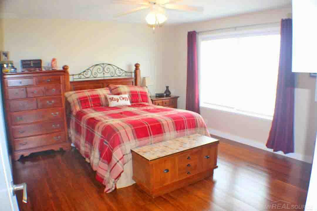 8577 Peck Road Marlette, MI 48453 - Photo 14 of 27 Master bedroom (12.9x14.5) at the end of the hallway.