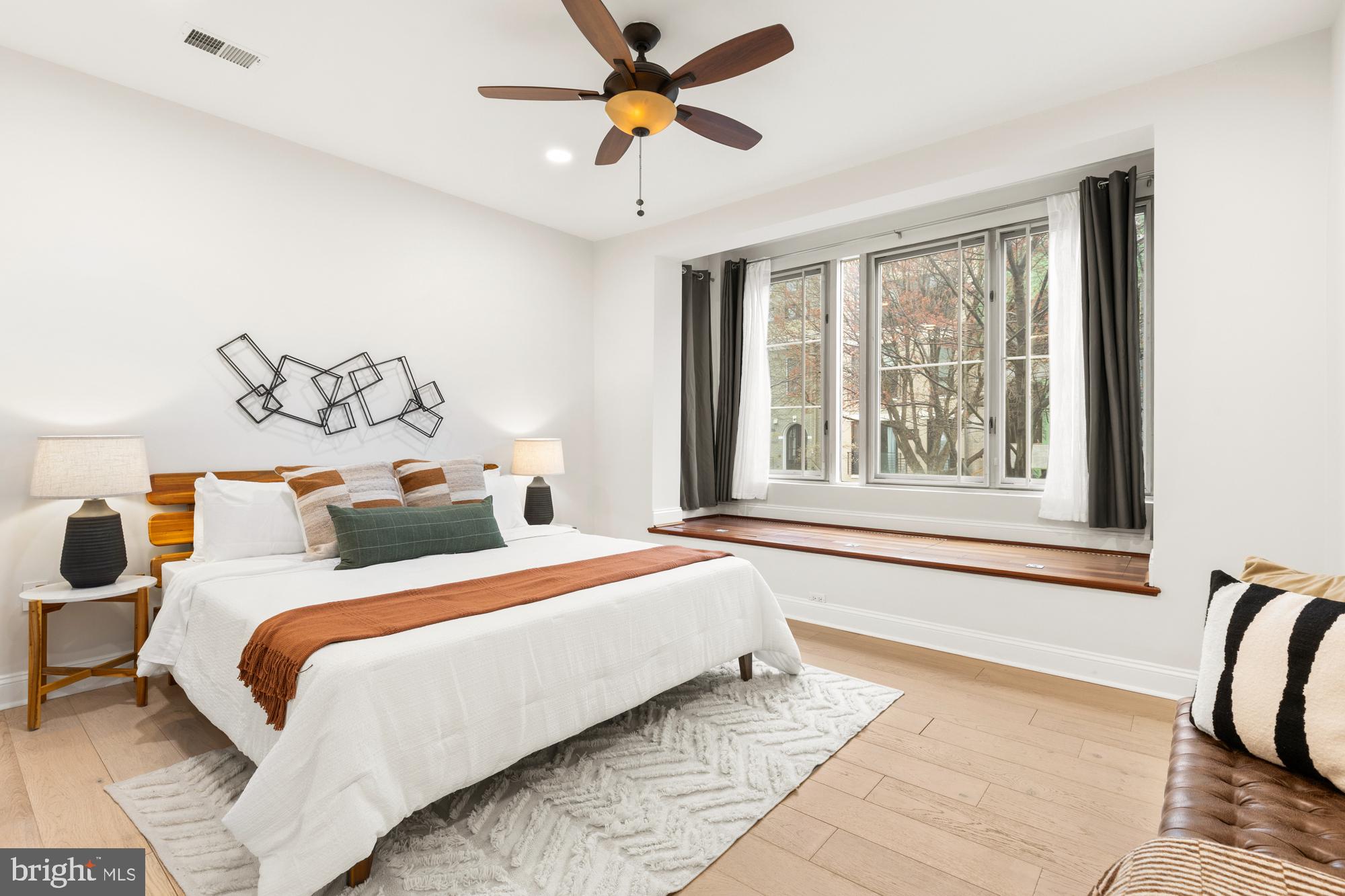 1464 Harvard Street Northwest, Unit 3 Washington, DC 20009 - Photo 20 of 24 a bedroom with a large bed and a window