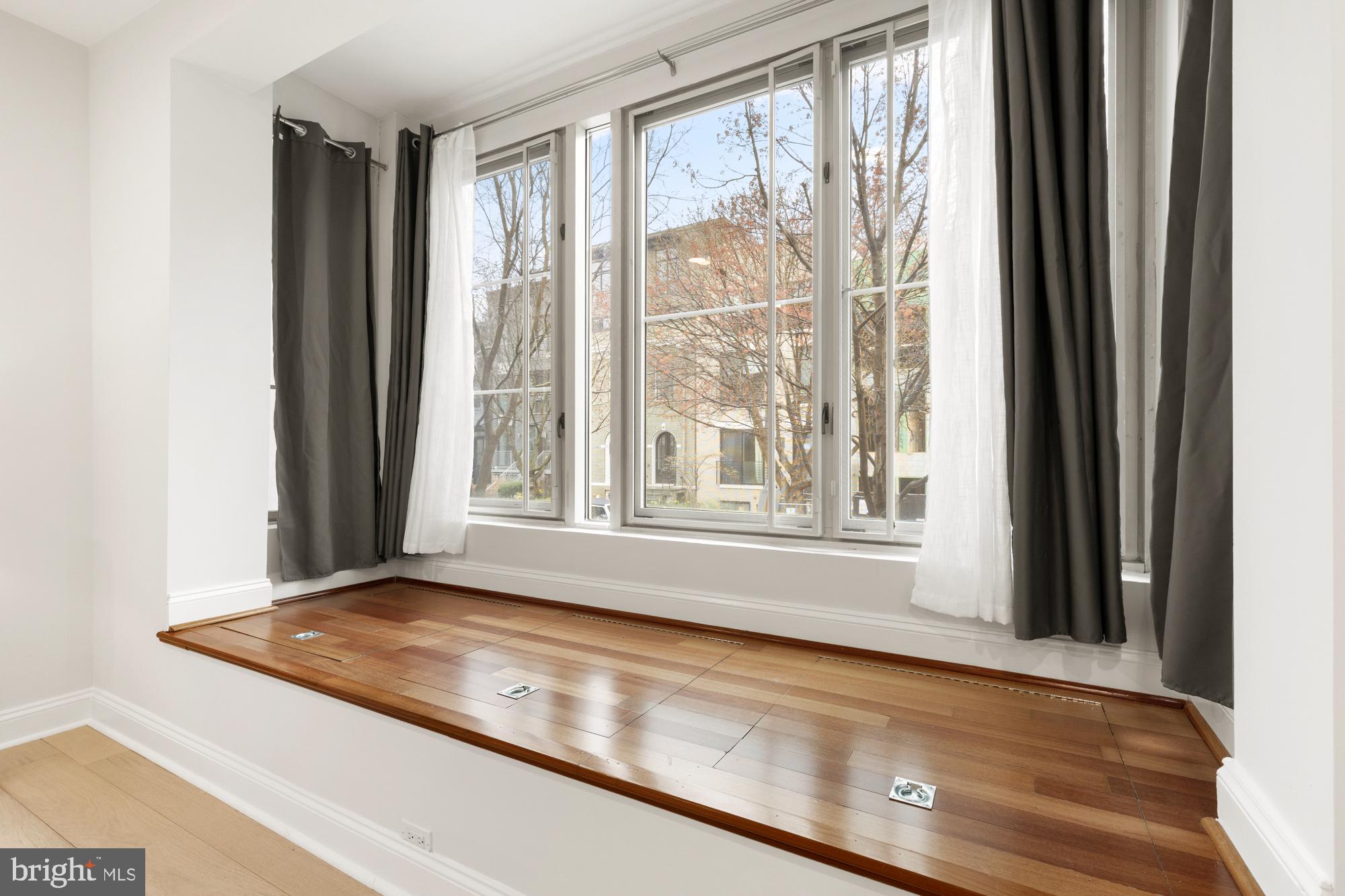 1464 Harvard Street Northwest, Unit 3 Washington, DC 20009 - Photo 21 of 24 a view of a living room and a window
