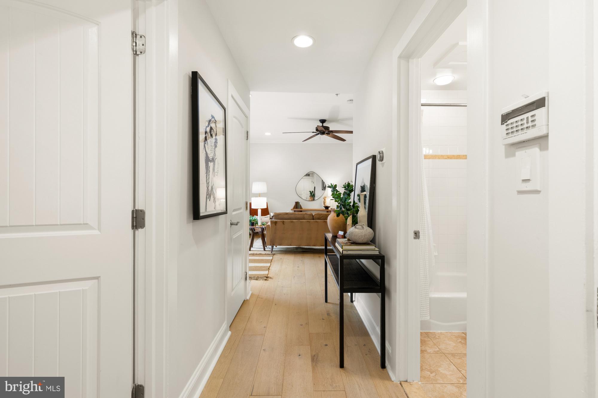 1464 Harvard Street Northwest, Unit 3 Washington, DC 20009 - Photo 3 of 24 a view of living room with furniture and a mirror
