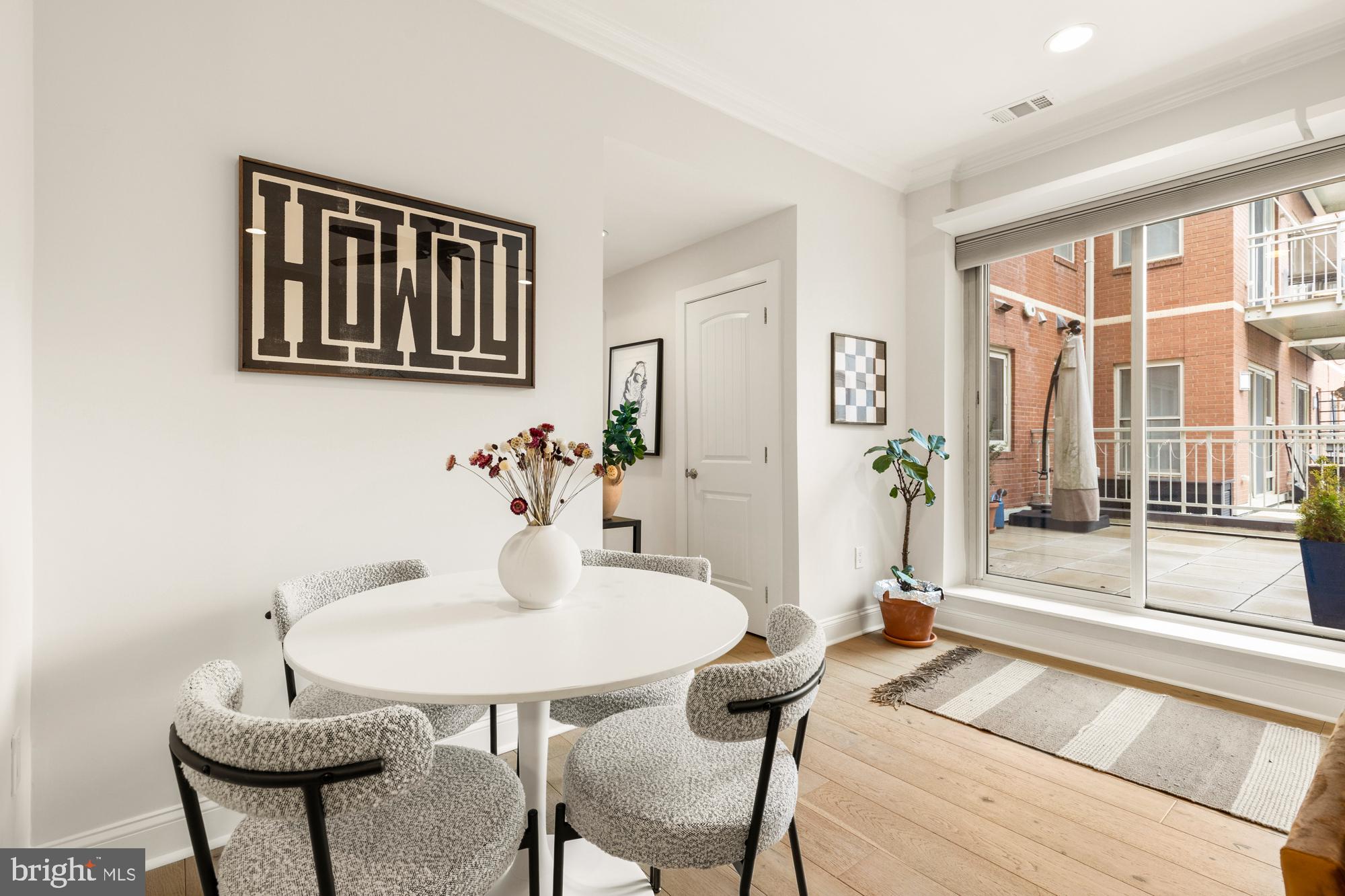 1464 Harvard Street Northwest, Unit 3 Washington, DC 20009 - Photo 9 of 24 a living room with furniture and a table