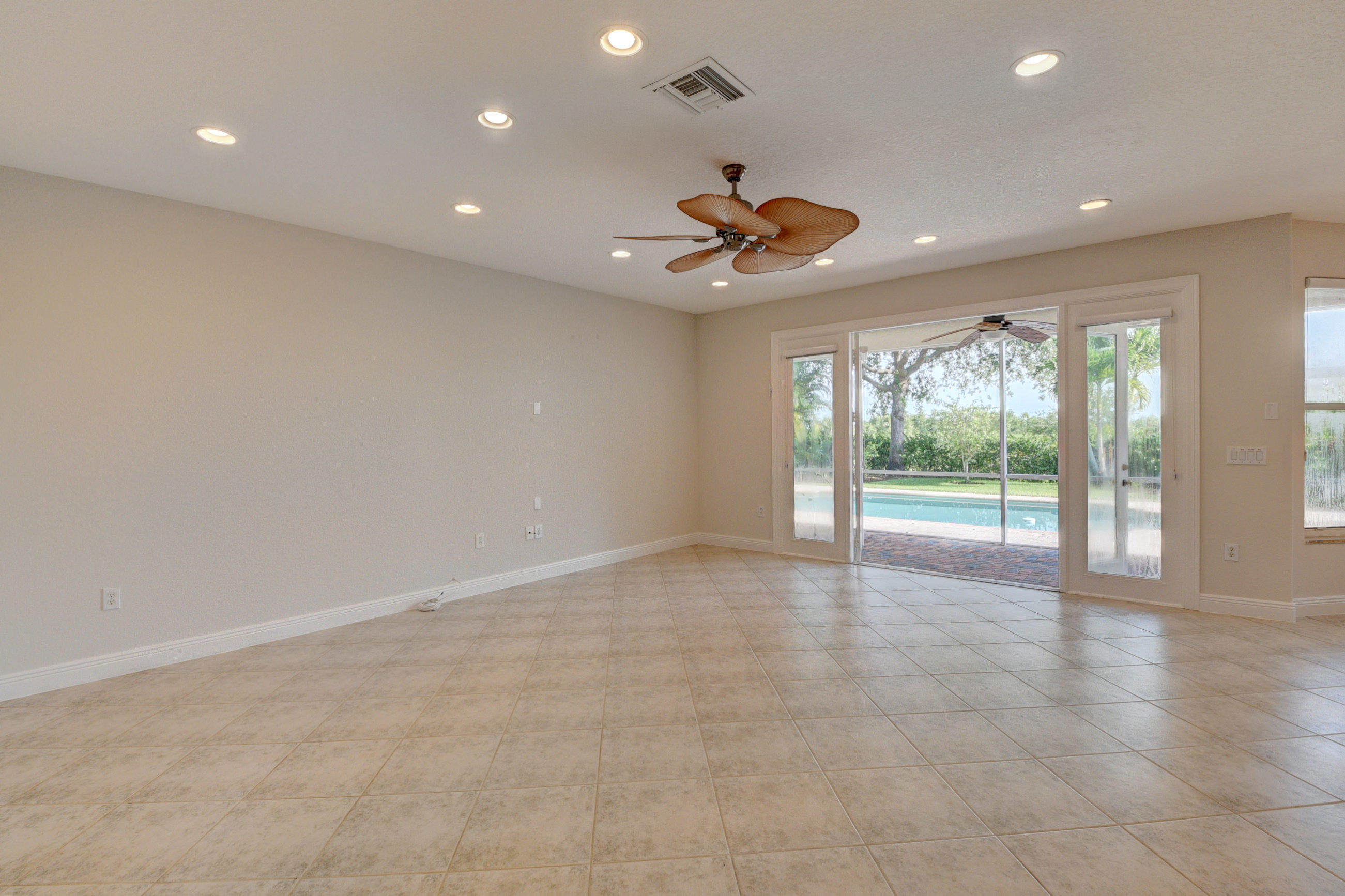 11785 Preservation Lane Boca Raton, FL 33498 - Photo 13 of 53 a view of an empty room with a window
