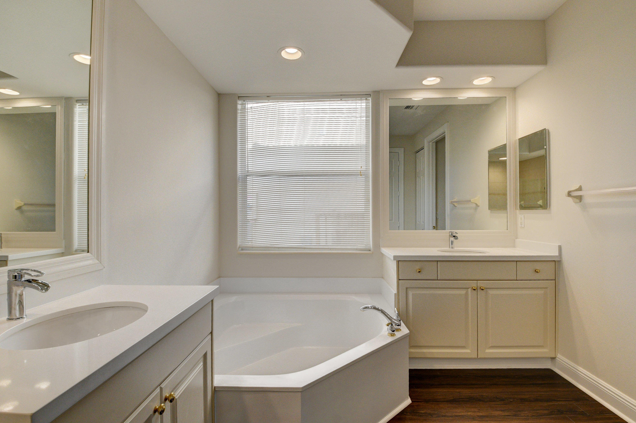11785 Preservation Lane Boca Raton, FL 33498 - Photo 18 of 53 a bathroom with a tub sink and mirror