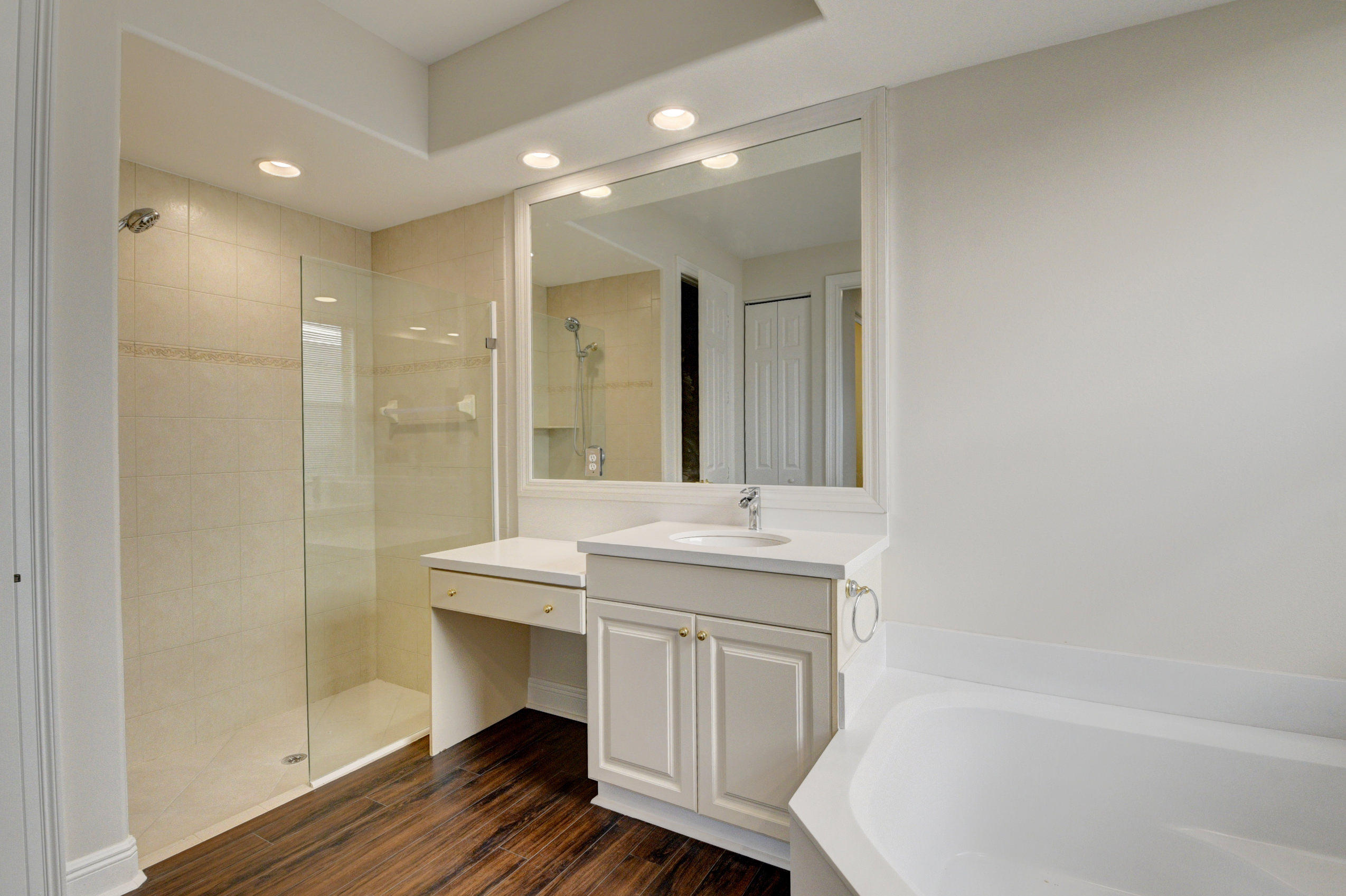 11785 Preservation Lane Boca Raton, FL 33498 - Photo 19 of 53 a bathroom with a sink and a mirror