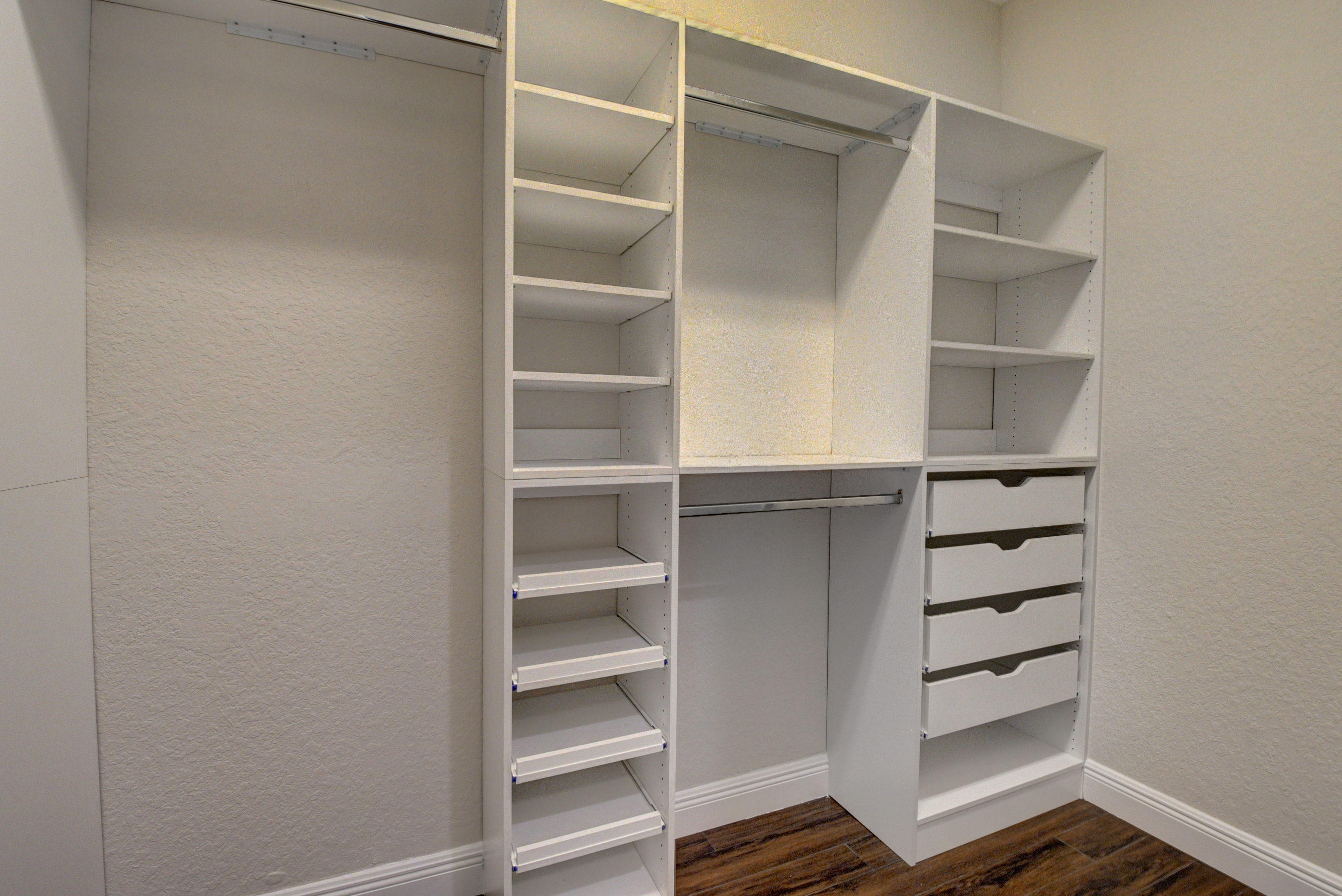 11785 Preservation Lane Boca Raton, FL 33498 - Photo 20 of 53 a view of walk in closet with empty racks