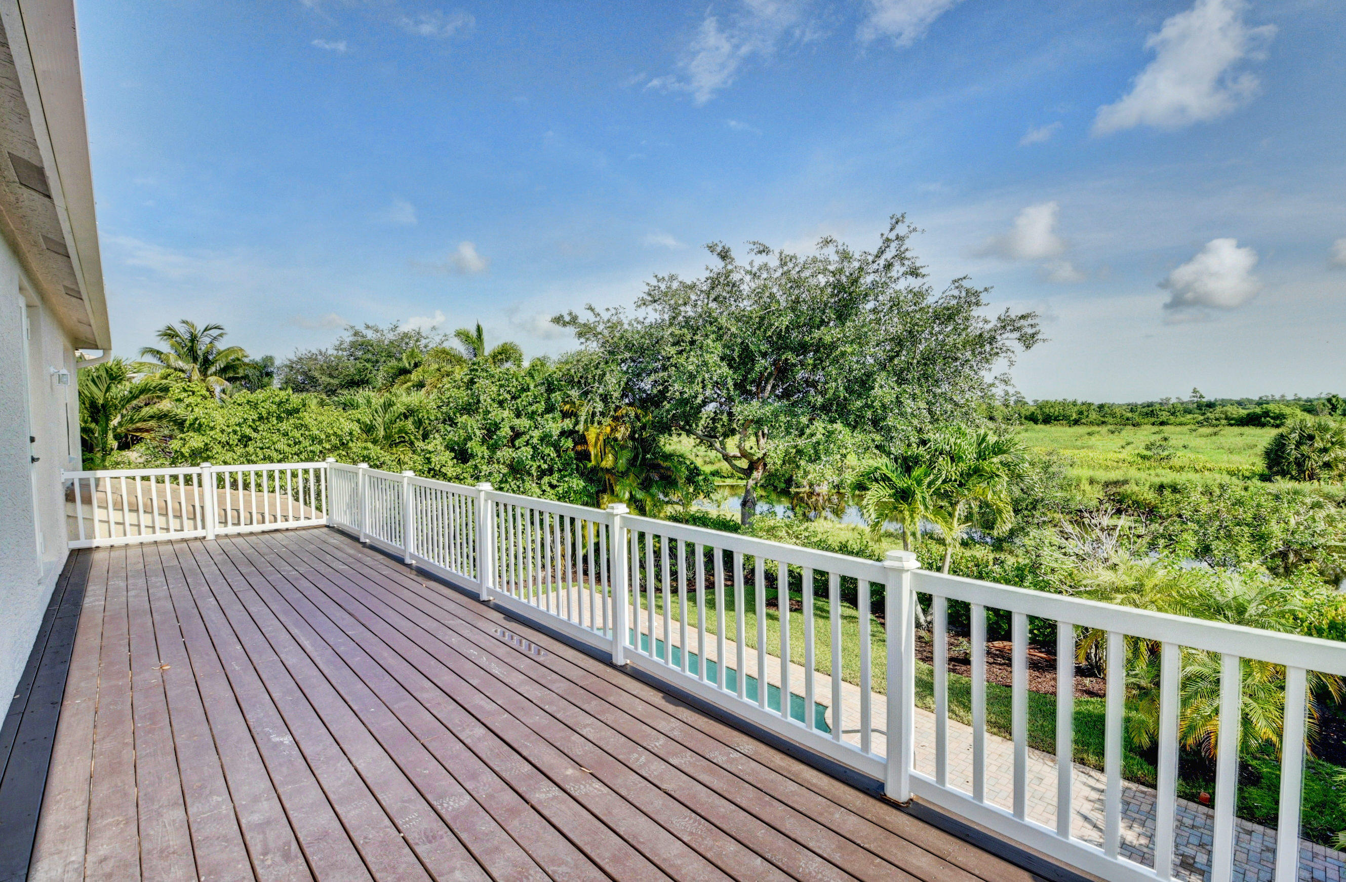 11785 Preservation Lane Boca Raton, FL 33498 - Photo 33 of 53 a view of balcony with wooden floor