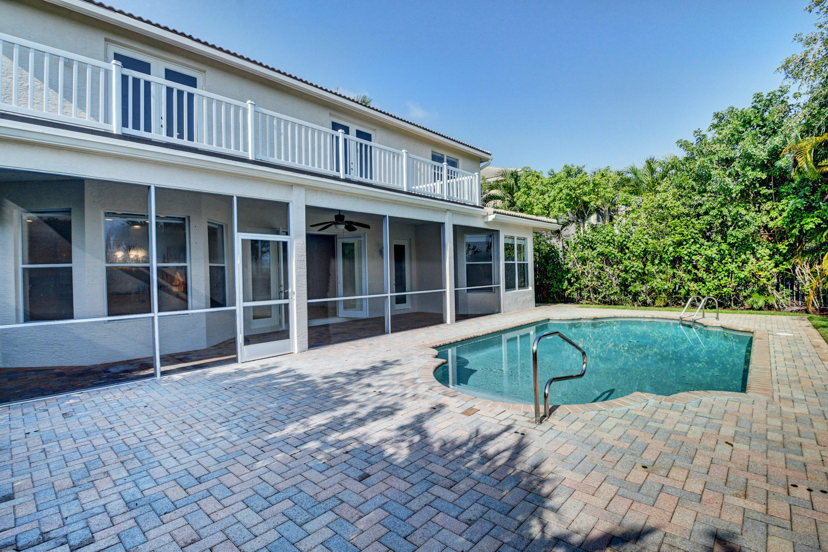 11785 Preservation Lane Boca Raton, FL 33498 - Photo 35 of 53 a view of a house with a backyard and porch