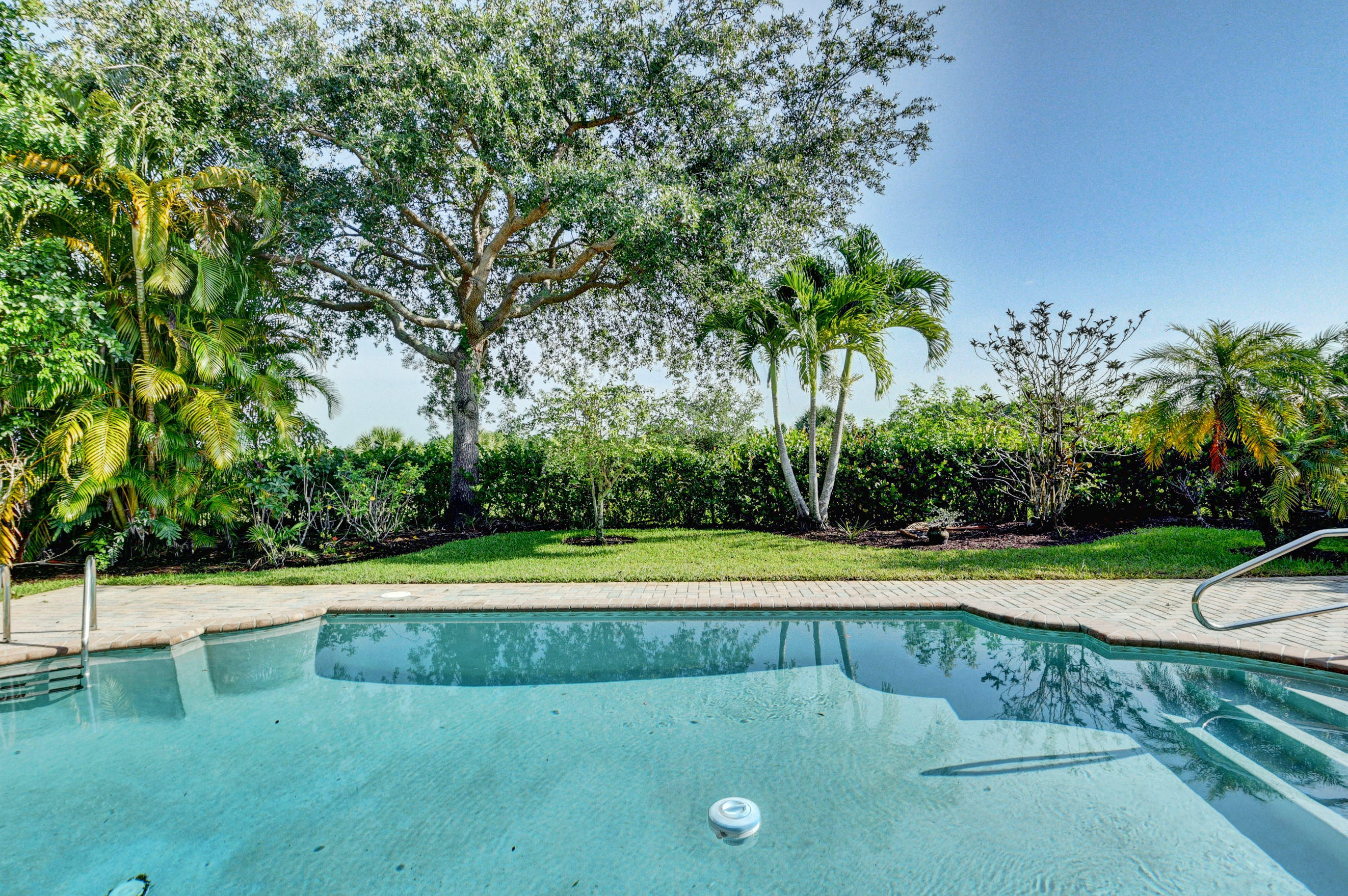 11785 Preservation Lane Boca Raton, FL 33498 - Photo 36 of 53 a view of a tennis ground with large trees