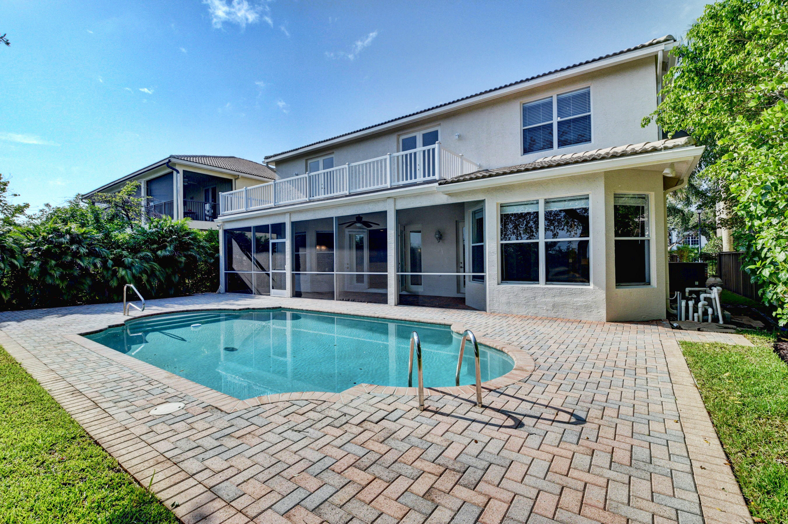 11785 Preservation Lane Boca Raton, FL 33498 - Photo 38 of 53 a view of a house with pool fire pit a yard and potted plants
