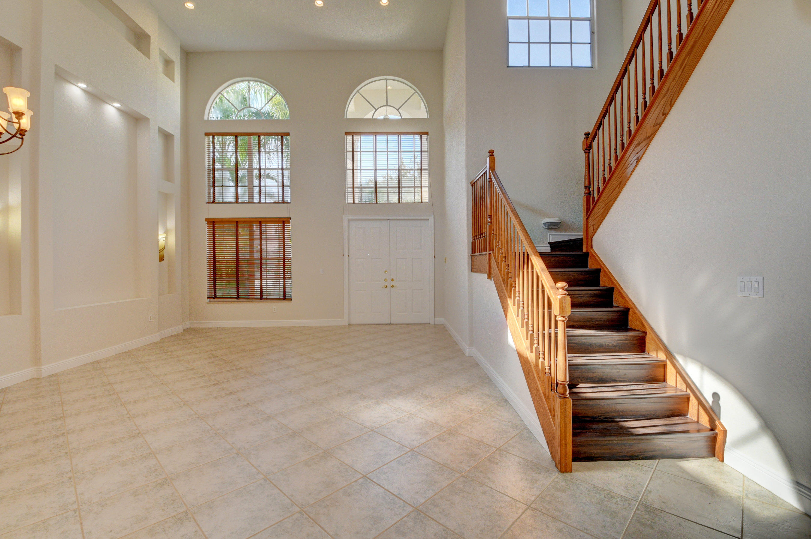 11785 Preservation Lane Boca Raton, FL 33498 - Photo 4 of 53 a view of an entryway with staircase