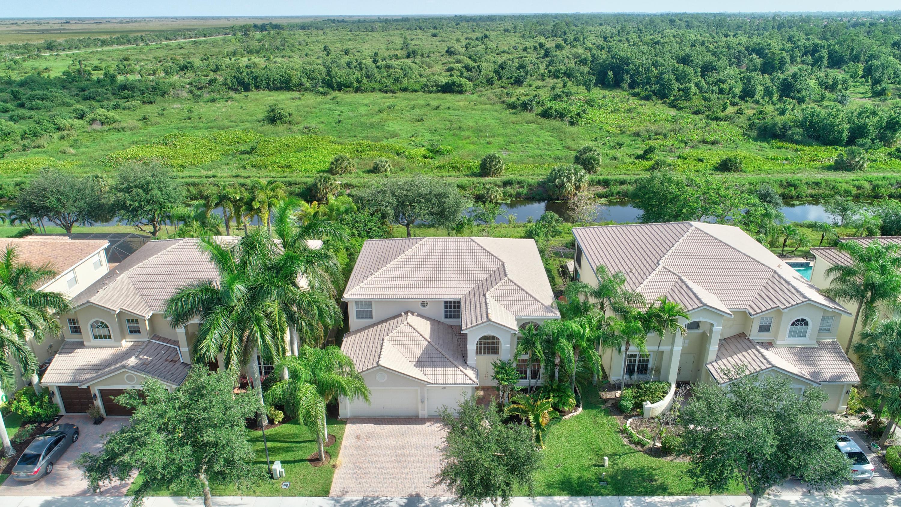 11785 Preservation Lane Boca Raton, FL 33498 - Photo 51 of 53 an aerial view of house with yard