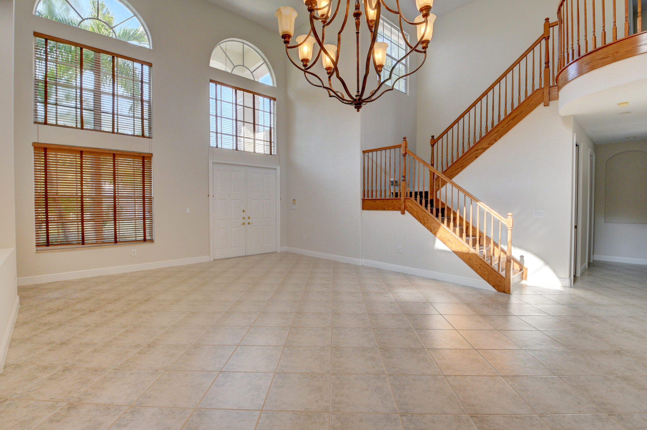 11785 Preservation Lane Boca Raton, FL 33498 - Photo 7 of 53 a view of an entryway with staircase