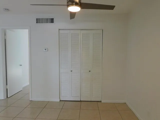 a kitchen with a cabinets and appliances