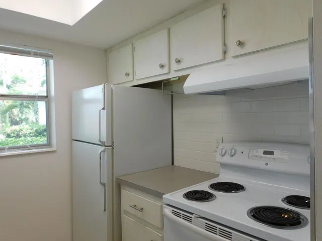 a view of a hallway with closet