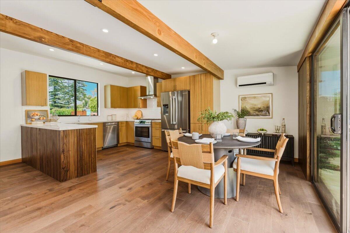 151 Kinman Avenue Goleta, CA 93117 - Photo 5 of 20 a view of a dining room with furniture and wooden floor