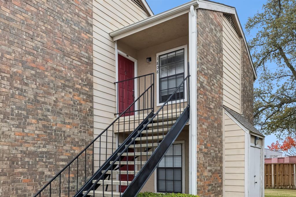 4748 Old Bent Tree Lane, Unit 1808 Dallas, TX 75287 - Photo 20 of 28 a balcony view with staircase
