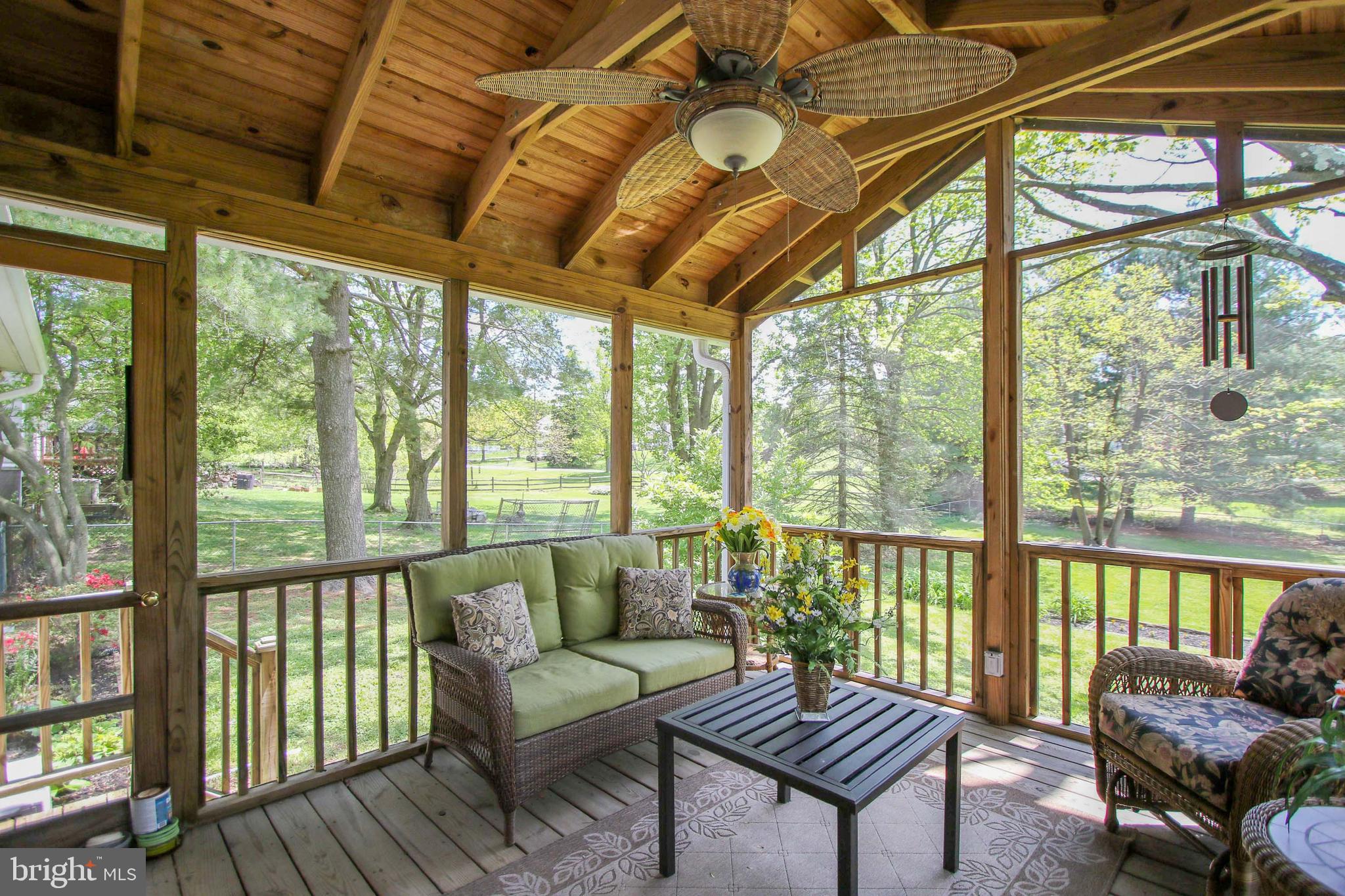 8409 West Grove Road Ellicott City, MD 21043 - Photo 11 of 35 Screened-In Porch with cathedral ceiling & fan