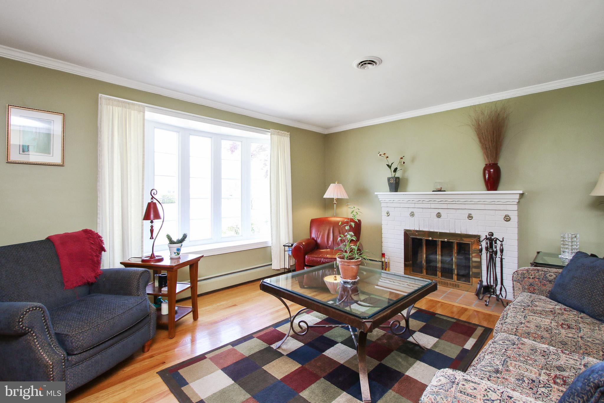 8409 West Grove Road Ellicott City, MD 21043 - Photo 3 of 35 Living Room with Bay Window & W/B fireplace
