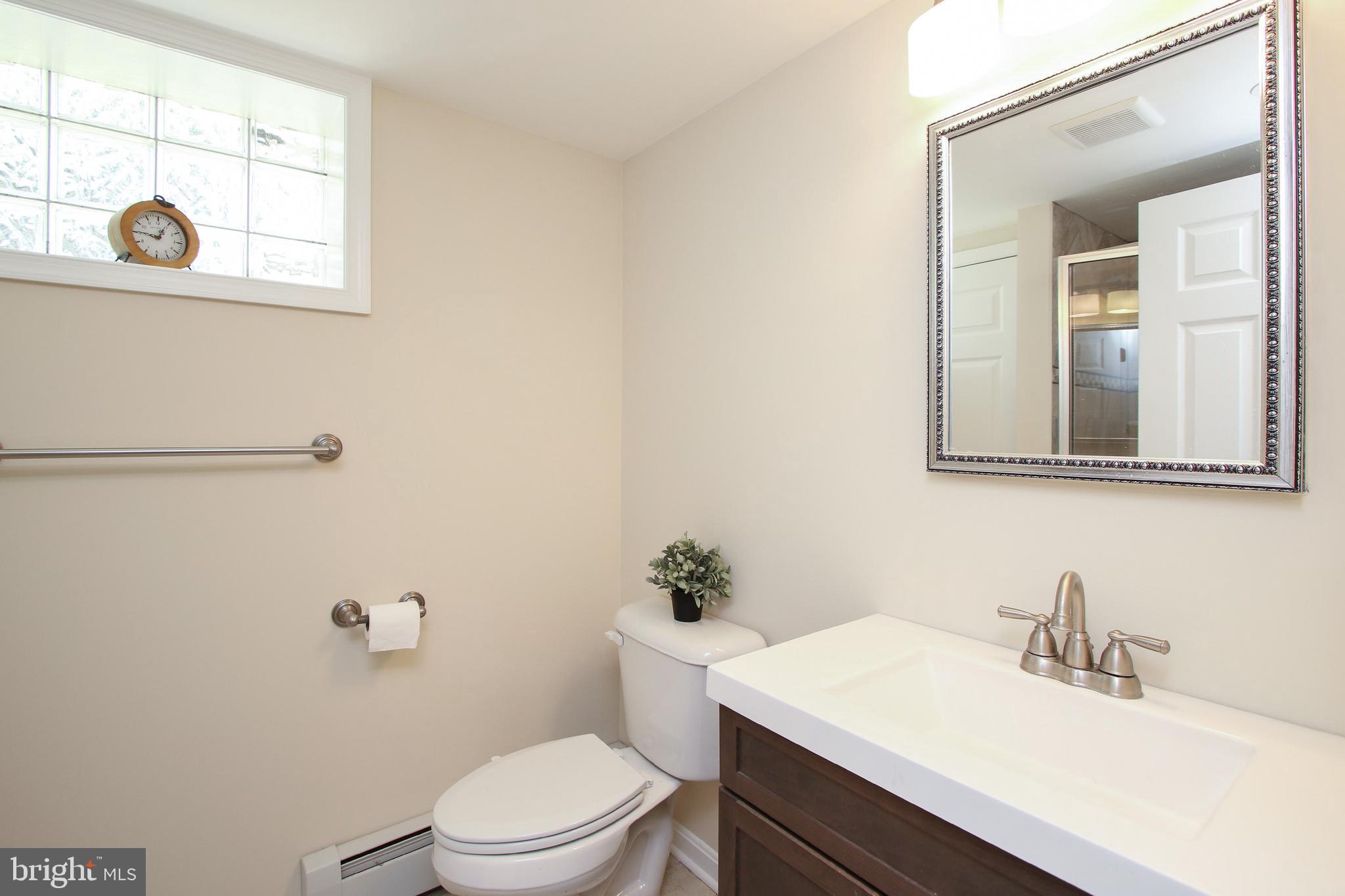 8409 West Grove Road Ellicott City, MD 21043 - Photo 34 of 35 Full Bath with lux vinyl plank flooring